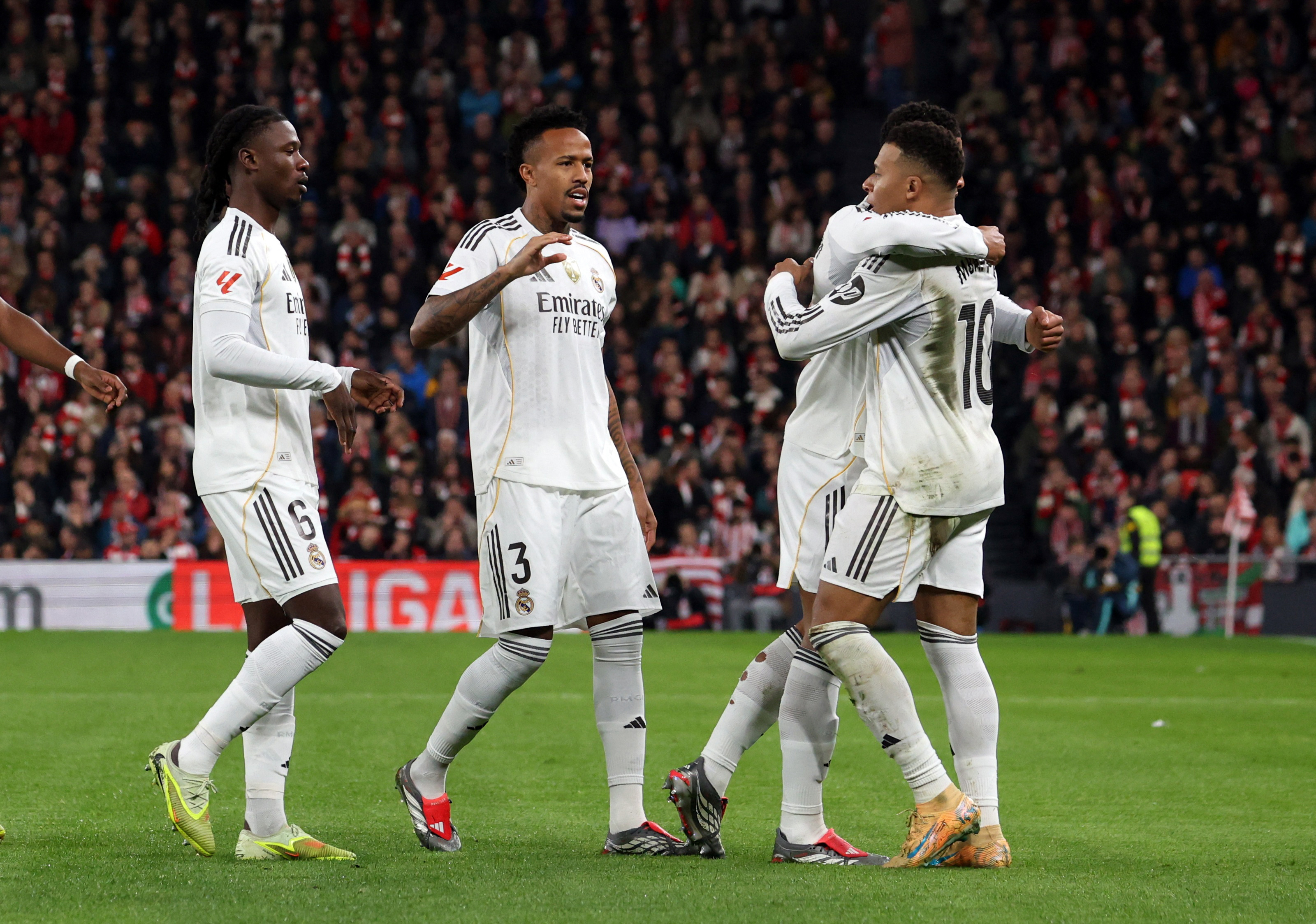 Soccer Football - LaLiga - Athletic Bilbao v Real Madrid - San Mames, Bilbao, Spain - December 3, 2025 Real Madrid's Kylian Mbappe celebrates scoring their first goal with teammates REUTERS/Pankra Nieto
