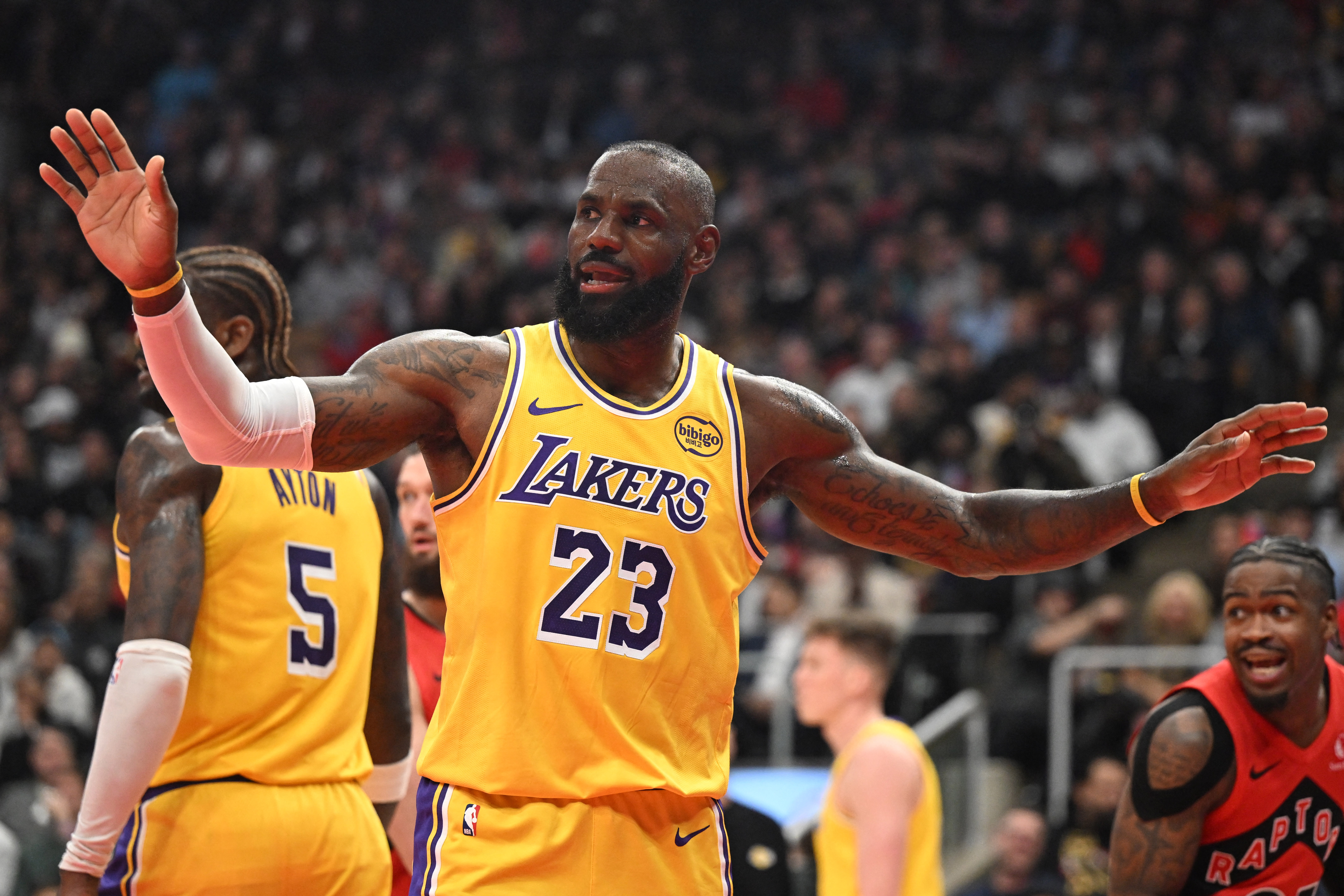 Dec 4, 2025; Toronto, Ontario, CAN; Los Angeles Lakers forward LeBron James (23) reacts after losing the ball against the Toronto Raptors in the first half at Scotiabank Arena. Mandatory Credit: Dan Hamilton-Imagn Images