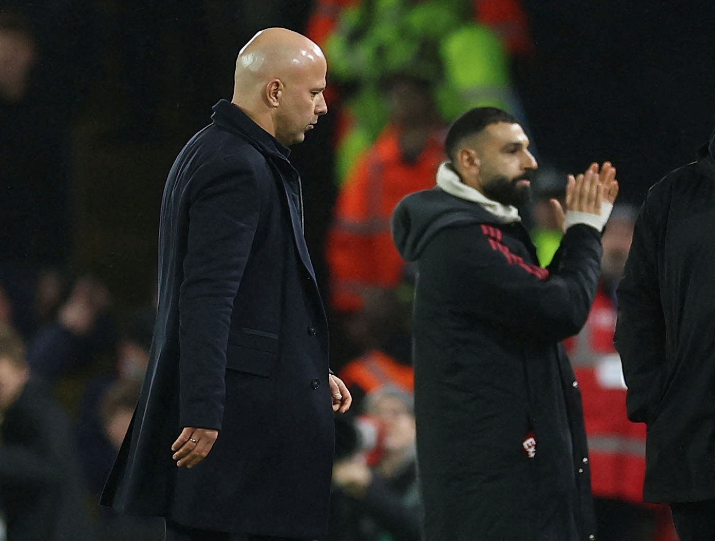 Soccer Football - Premier League - Leeds United v Liverpool - Elland Road, Leeds, Britain - December 6, 2025 Liverpool manager Arne Slot and Mohamed Salah after the match Action Images via Reuters/Andrew Boyers  EDITORIAL USE ONLY. NO USE WITH UNAUTHORIZE