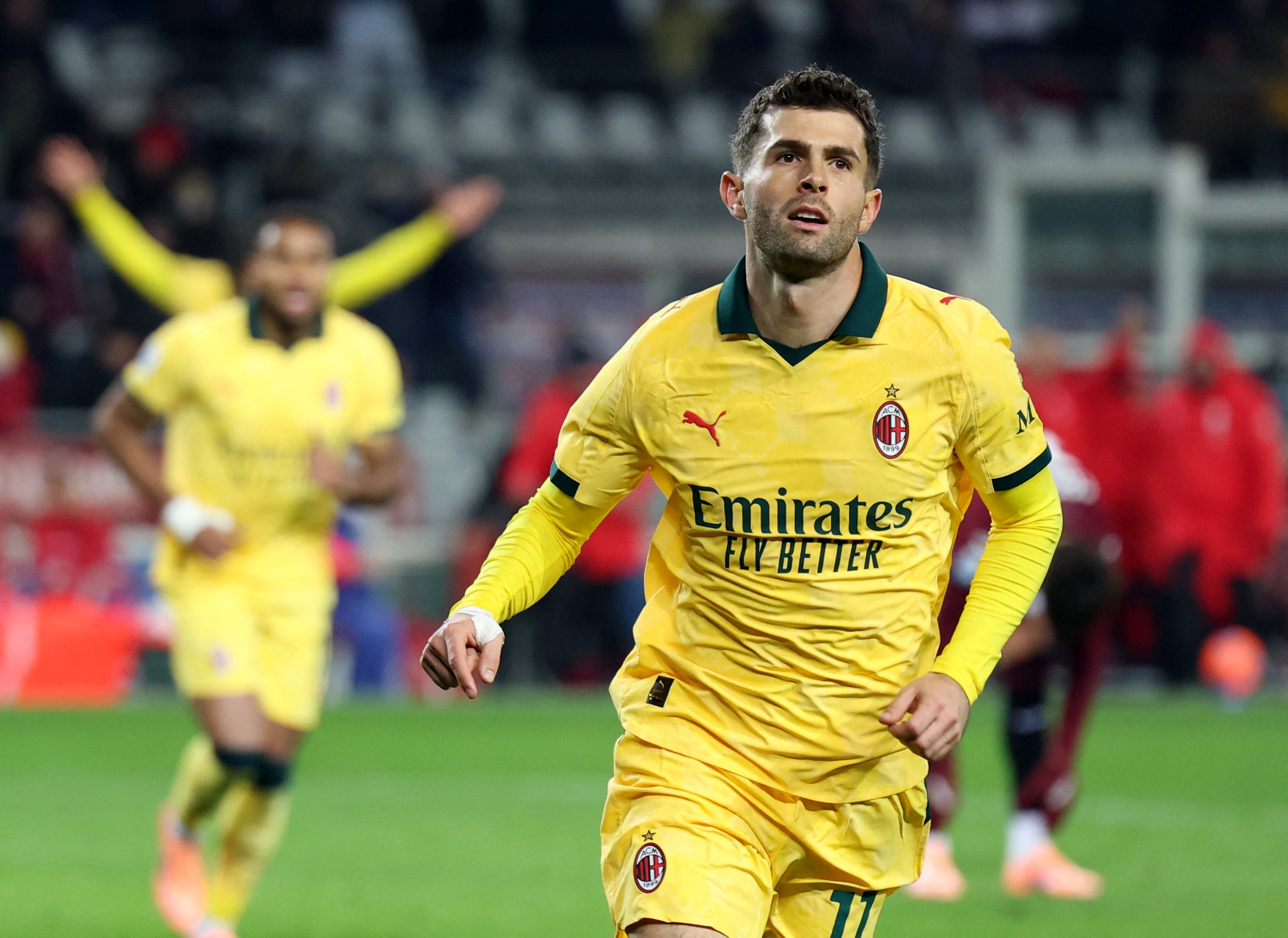 Soccer Football - Serie A - Torino v AC Milan - Stadio Olimpico Grande Torino, Turin, Italy - December 8, 2025 AC Milan's Christian Pulisic celebrates scoring their third goal REUTERS/Claudia Greco