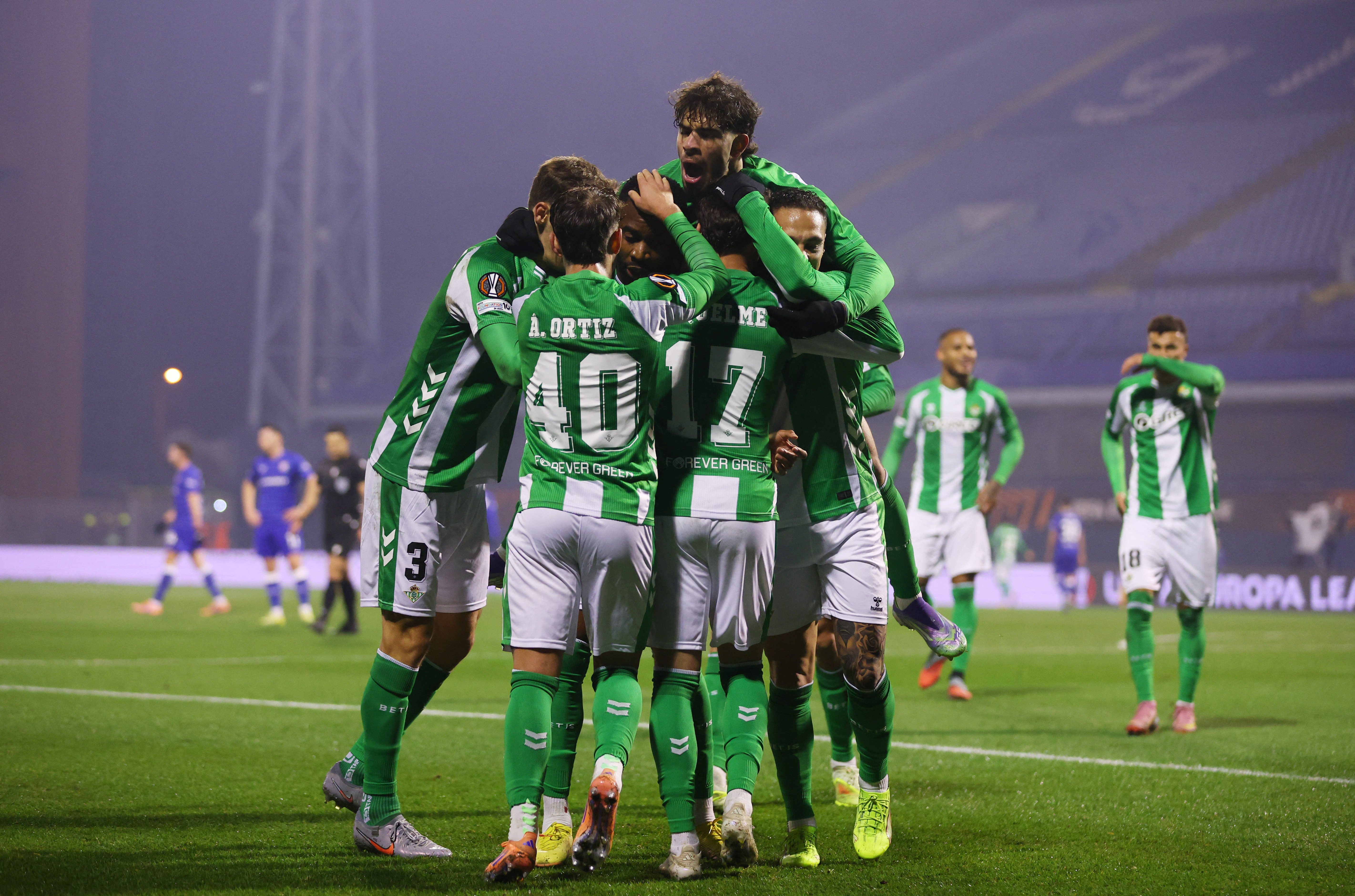 Soccer Football - UEFA Europa League - GNK Dinamo Zagreb v Real Betis - Stadion Maksimir, Zagreb, Croatia - December 11, 2025 Real Betis' Rodrigo Riquelme celebrates scoring their second goal with teammates REUTERS/Antonio Bronic