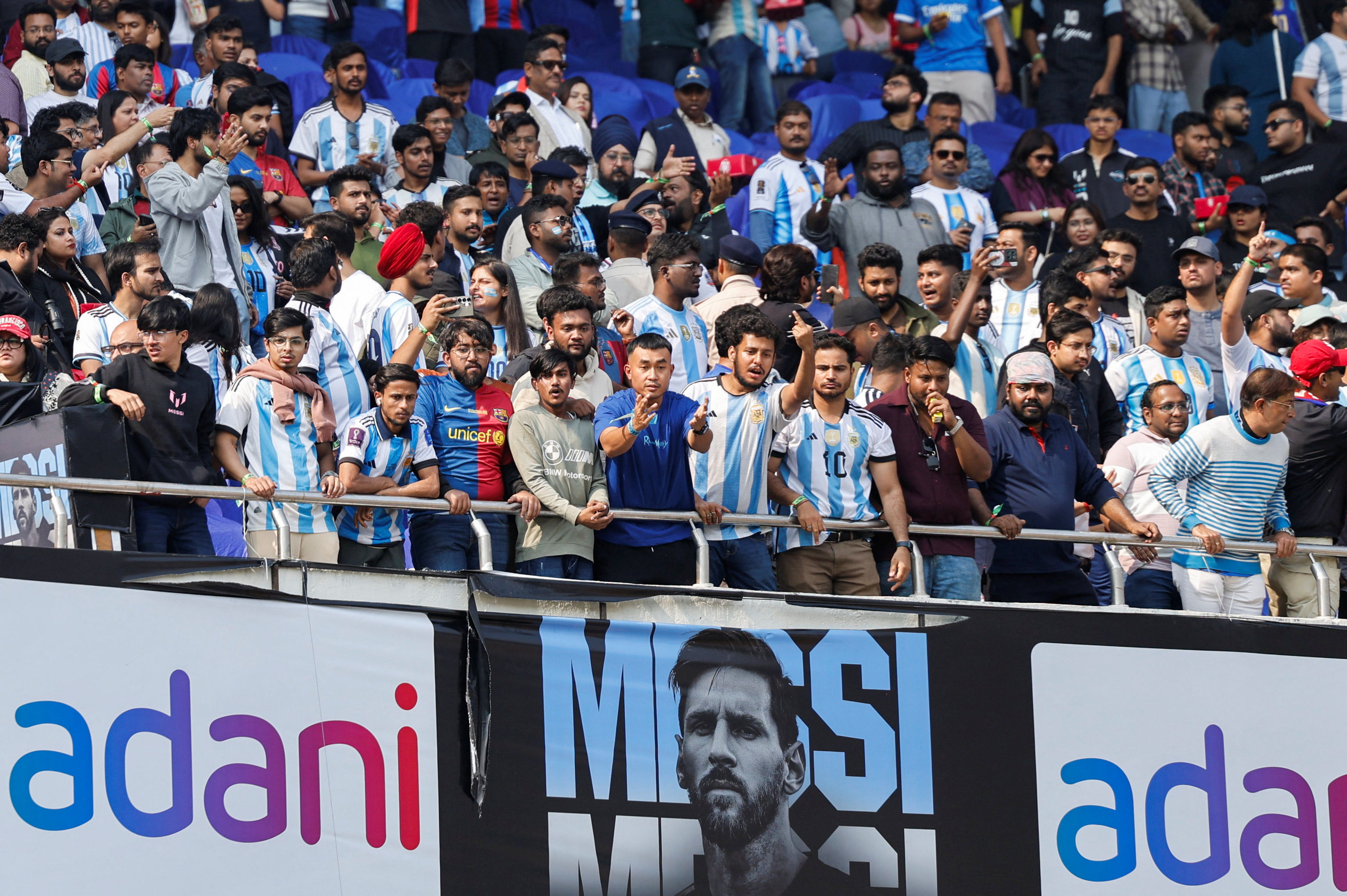Disappointed fans gesture after Argentine soccer star Lionel Messi left the Vivekananda Yuva Bharati Krirangan stadium during his India tour, Kolkata, India, December 13, 2025. REUTERS/Sahiba Chawdhary