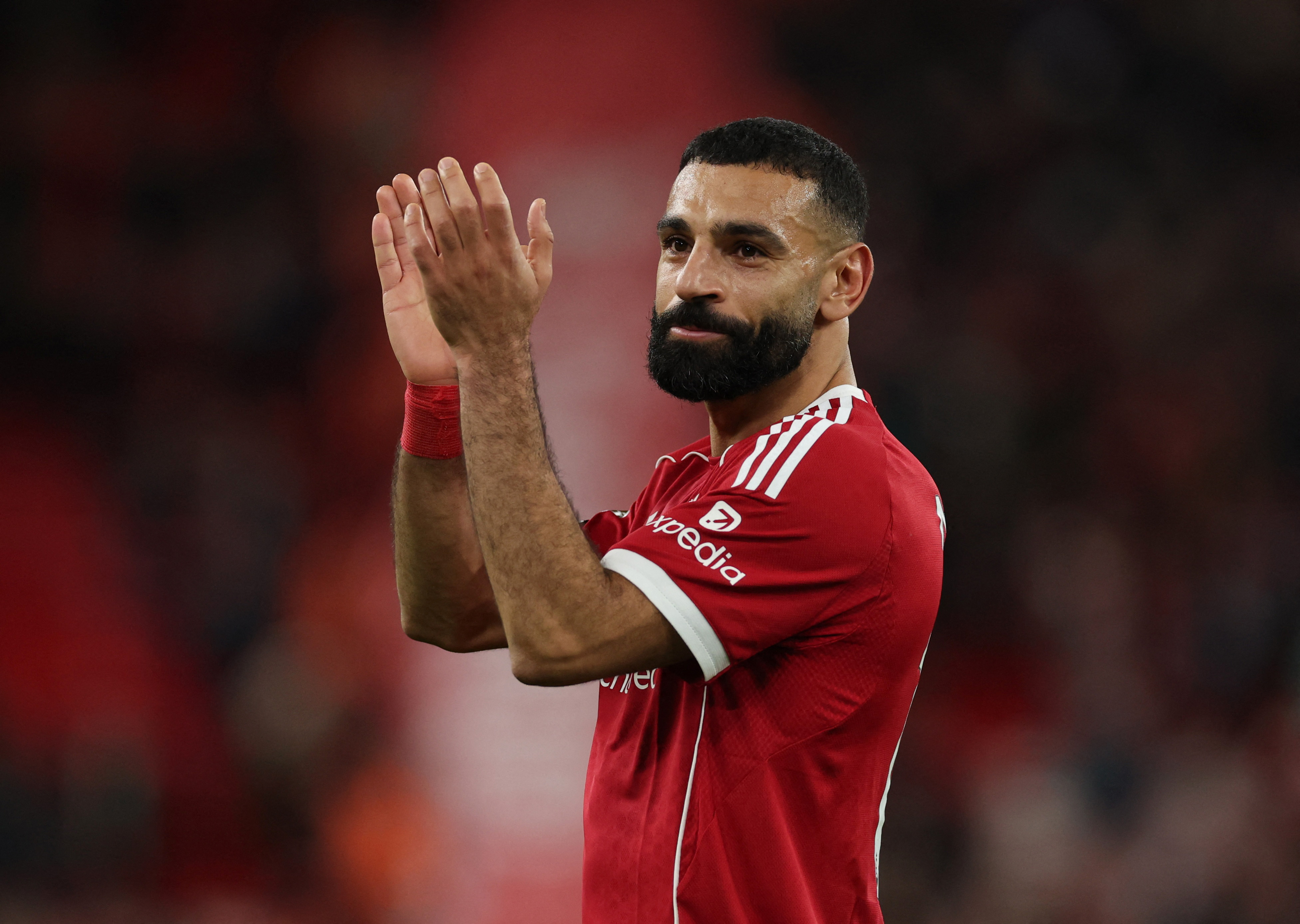 Soccer Football - Premier League - Liverpool v Brighton & Hove Albion - Anfield, Liverpool, Britain - December 13, 2025 Liverpool's Mohamed Salah applauds fans after the match REUTERS/Phil Noble EDITORIAL USE ONLY. NO USE WITH UNAUTHORIZED AUDIO, VIDEO, D