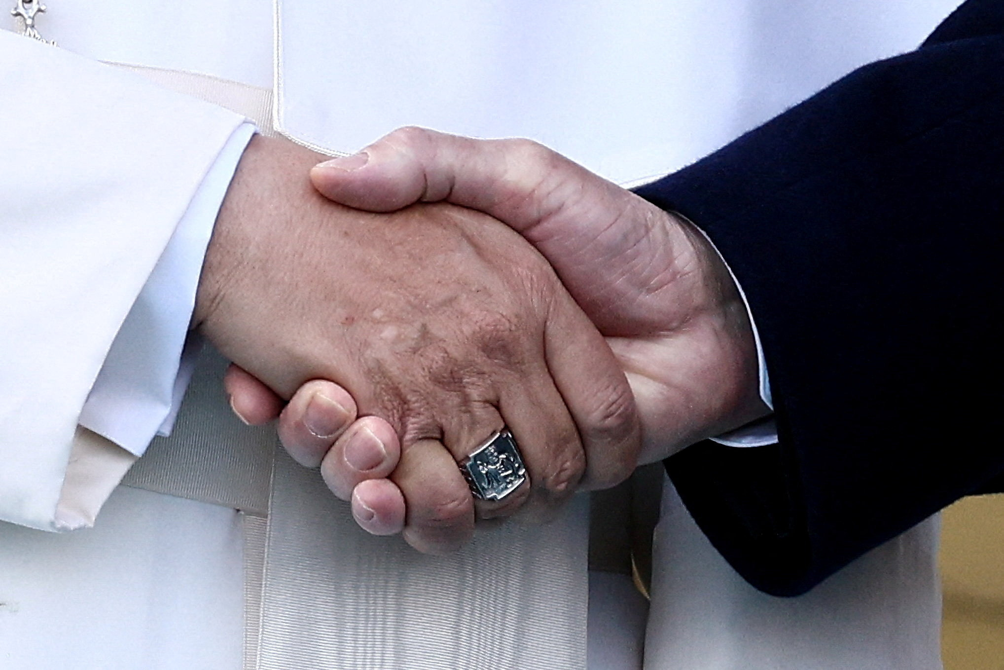 Pope Leo XIV shakes hands with Turkish President Tayyip Erdogan