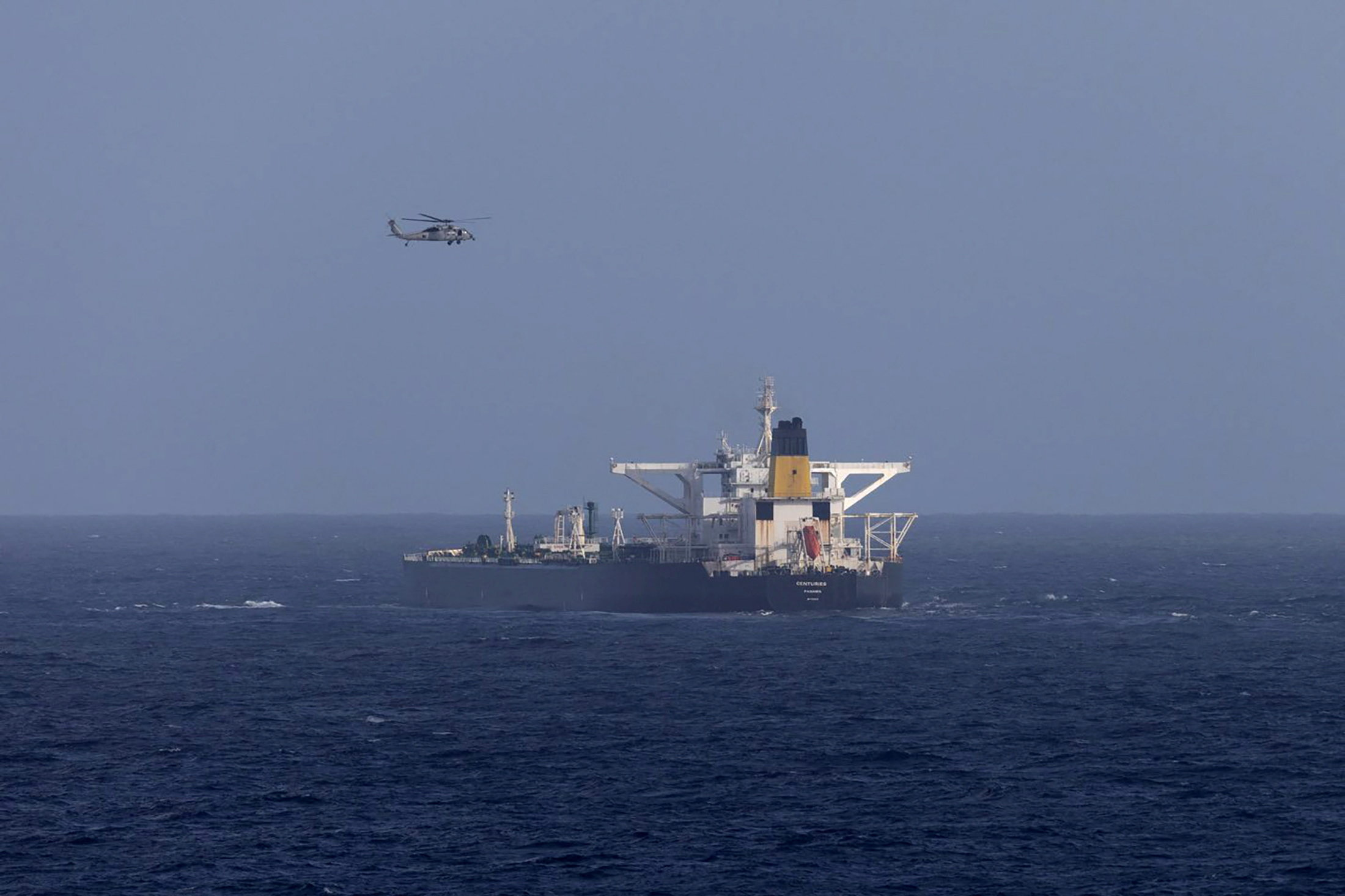 A U.S. military helicopter flies over the Panama-flagged Centuries, which was intercepted by the U.S. Coast GuardDHS/Handout via REUTERS    THIS IMAGE HAS BEEN SUPPLIED BY A THIRD PARTY