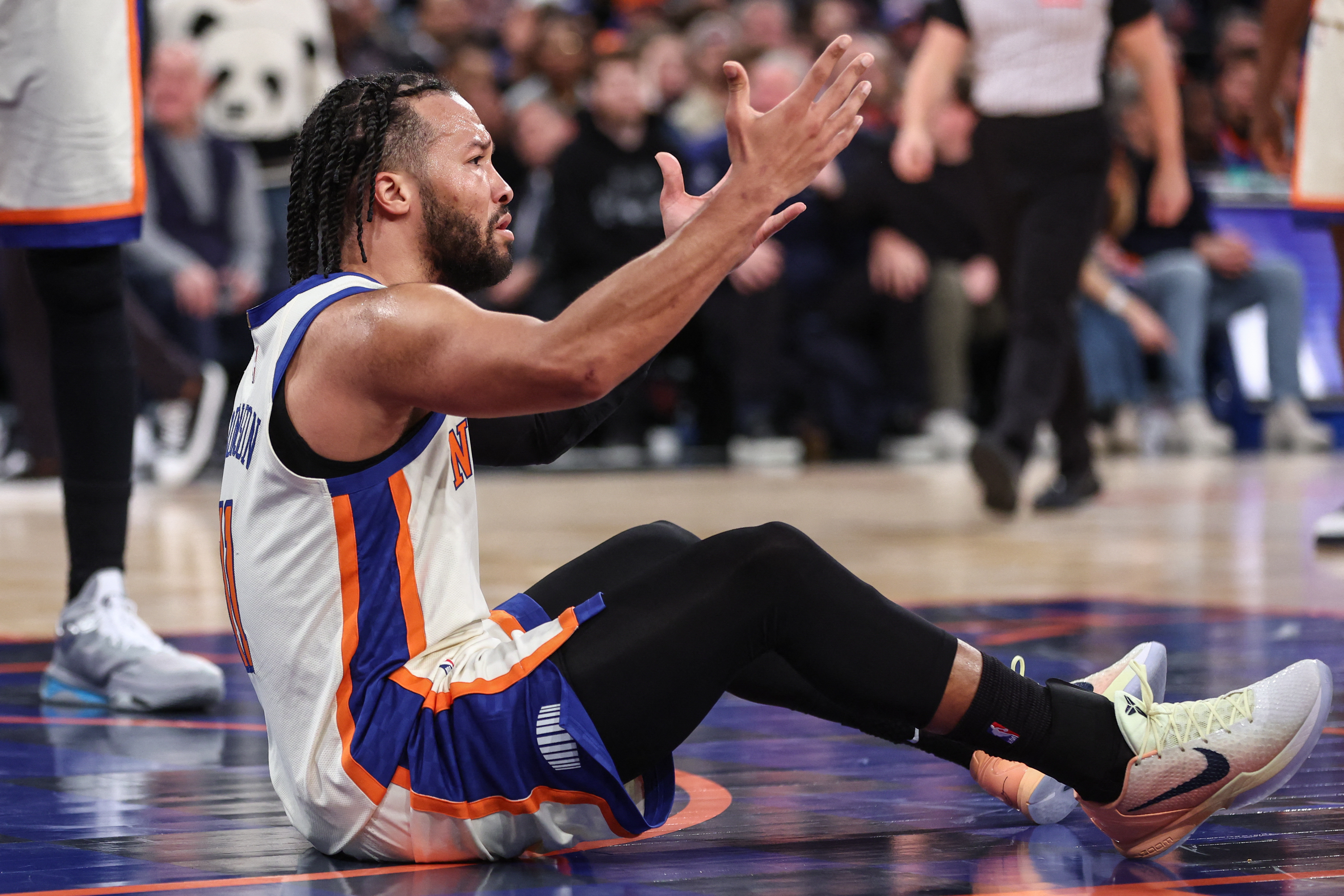 Dec 21, 2025; New York, New York, USA;  New York Knicks guard Jalen Brunson (11) reacts after getting called for a foul in the third quarter against the Miami Heat at Madison Square Garden. Mandatory Credit: Wendell Cruz-Imagn Images
