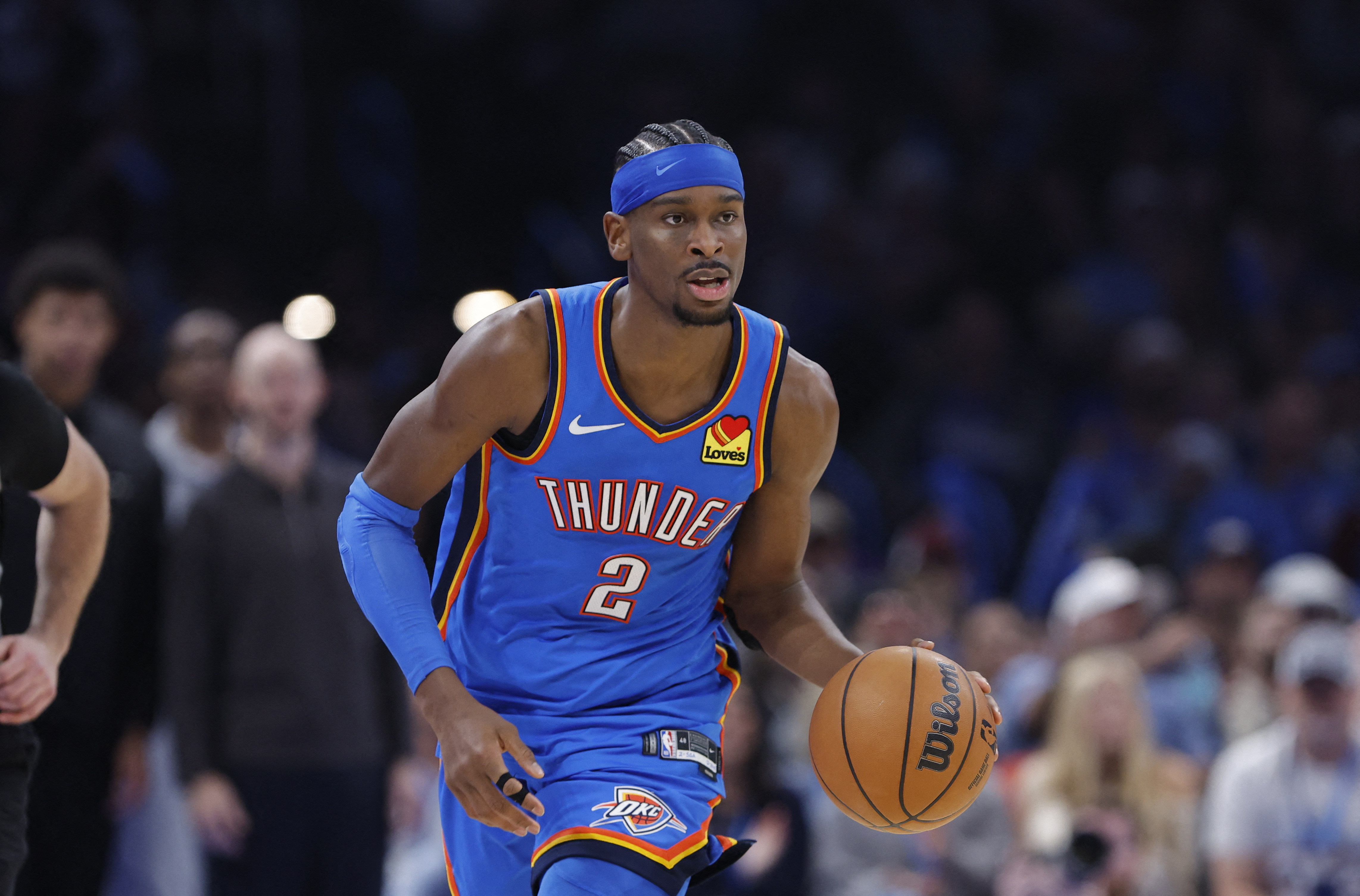 Dec 22, 2025; Oklahoma City, Oklahoma, USA; Oklahoma City Thunder guard Shai Gilgeous-Alexander (2) dribbles down the court against the Memphis Grizzlies during the second half at Paycom Center. Mandatory Credit: Alonzo Adams-Imagn Images