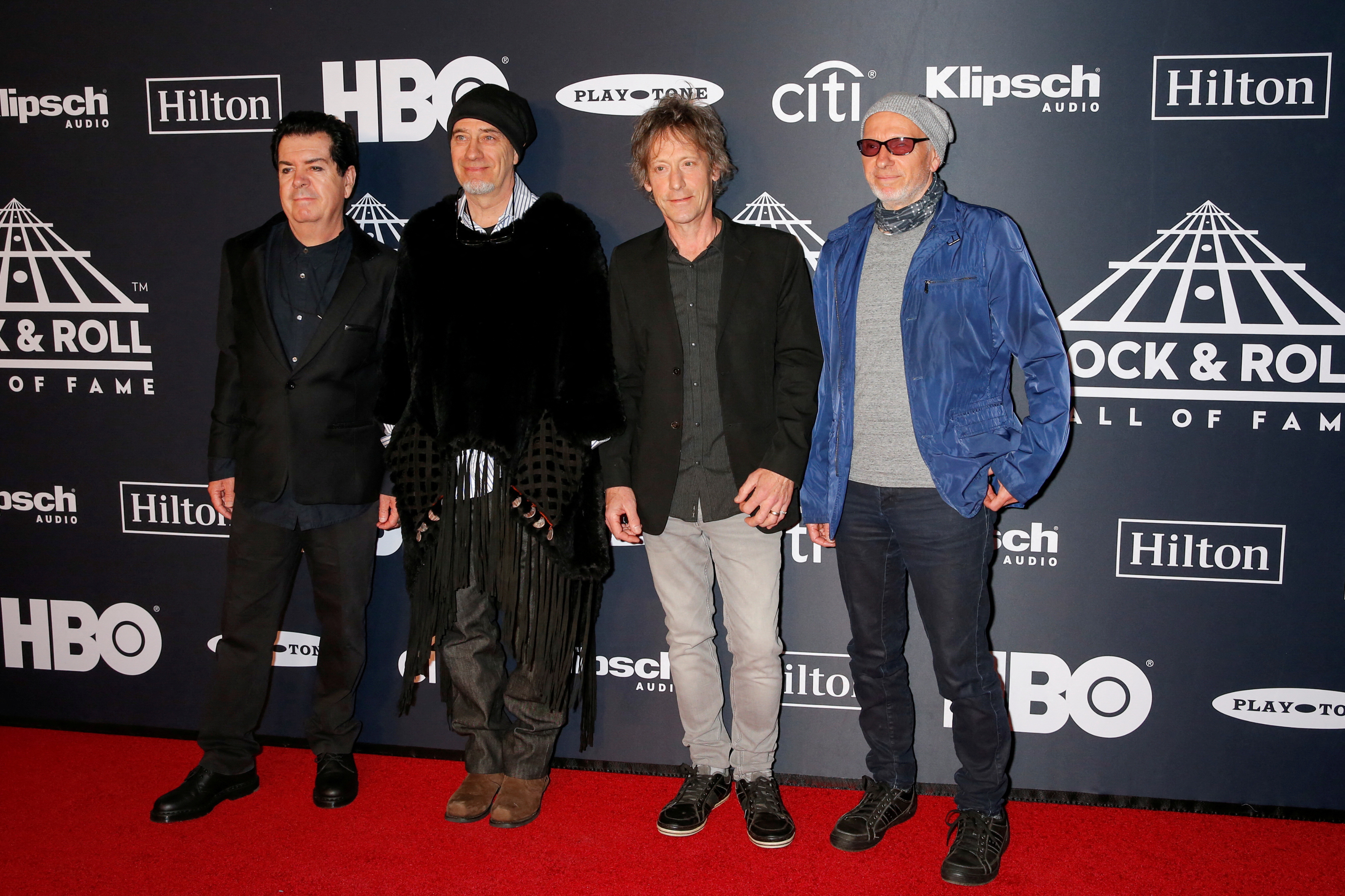 FILE PHOTO: (L-R) Inductees Lol Tolhurst, Michael Dempsey, Perry Bamonte and Boris Williams of The Cure attend the 2019 Rock and Roll Hall of Fame induction ceremony in Brooklyn, New York, U.S., March 29, 2019.  REUTERS/Eduardo Munoz/File Photo