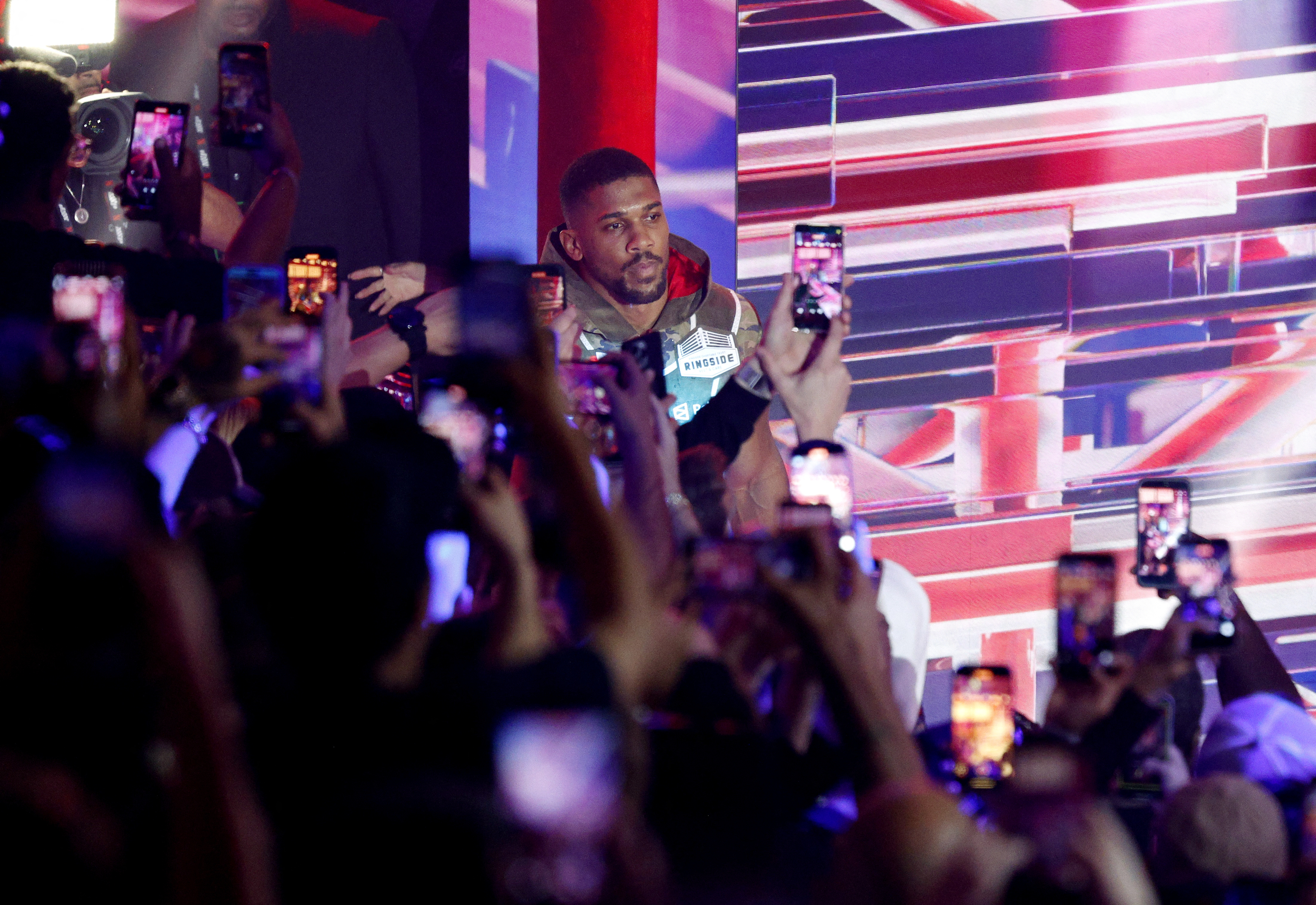 Boxing - Jake Paul v Anthony Joshua - Kaseya Center, Miami, Florida, U.S. - December 19, 2025 Anthony Joshua walks to the ring before his heavyweight fight against Jake Paul REUTERS/Marco Bello
