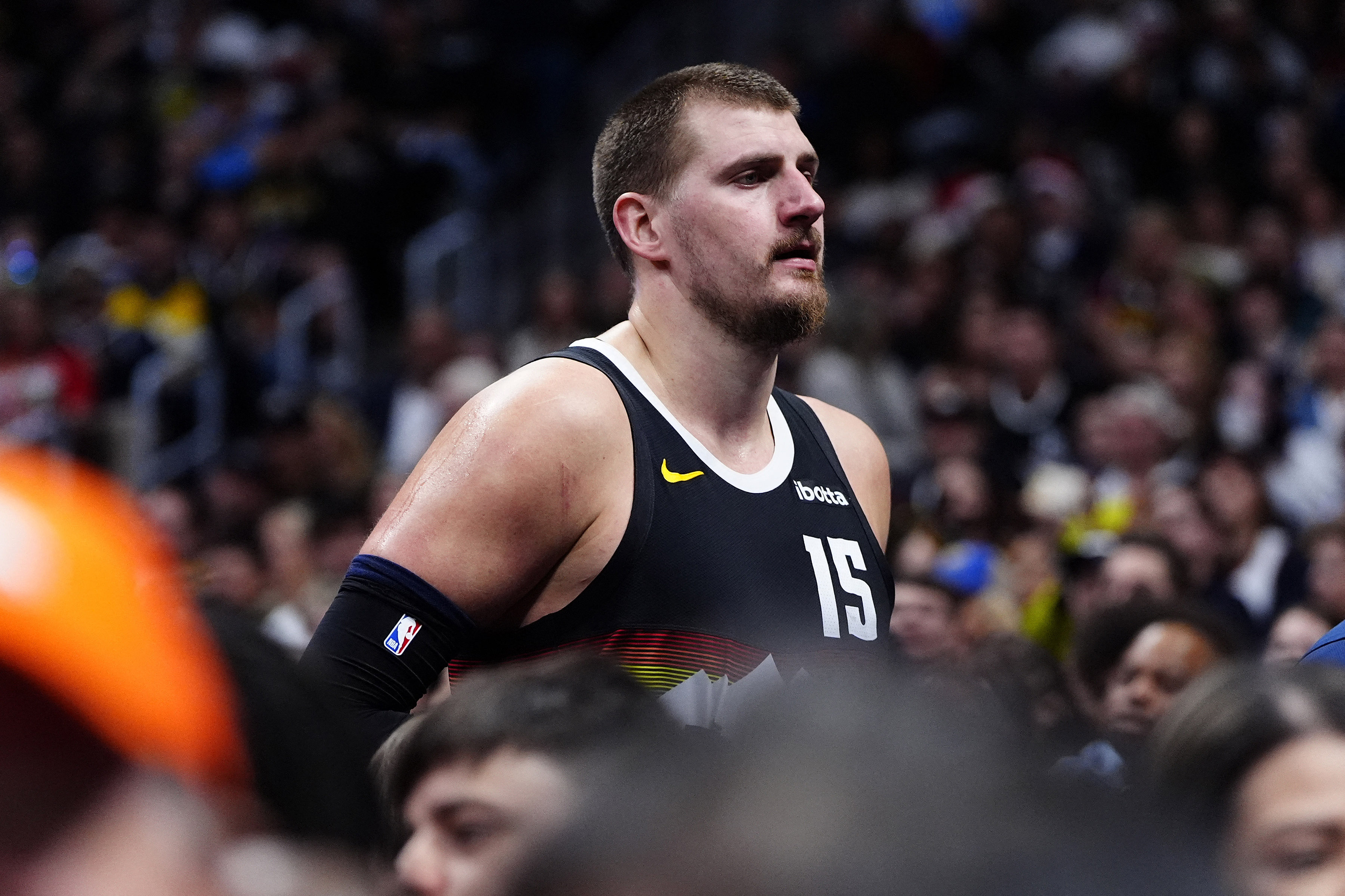 Dec 25, 2025; Denver, Colorado, USA; Denver Nuggets center Nikola Jokic (15) leaves the locker room during the second quarter against the Minnesota Timberwolves at Ball Arena. Mandatory Credit: Ron Chenoy-Imagn Images