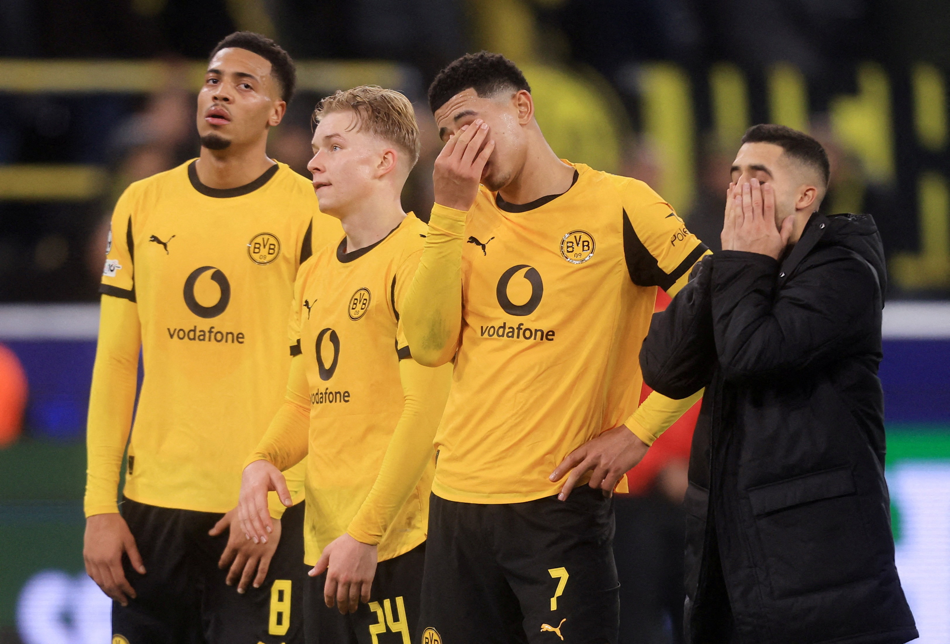 Soccer Football - UEFA Champions League - Borussia Dortmund v Bodo/Glimt - Signal Iduna Park, Dortmund, Germany - December 10, 2025 Borussia Dortmund's Jobe Bellingham and teammates look dejected after the match REUTERS/Leon Kuegeler     TPX IMAGES OF THE