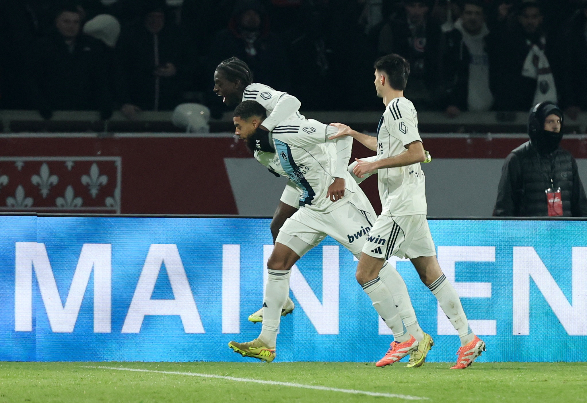 Soccer Football - Ligue 1 - Paris St Germain v Paris FC - Parc des Princes, Paris, France - January 4, 2026 Paris FC's Willem Geubbels celebrates scoring their first goal with teammates REUTERS/Catherine Steenkeste