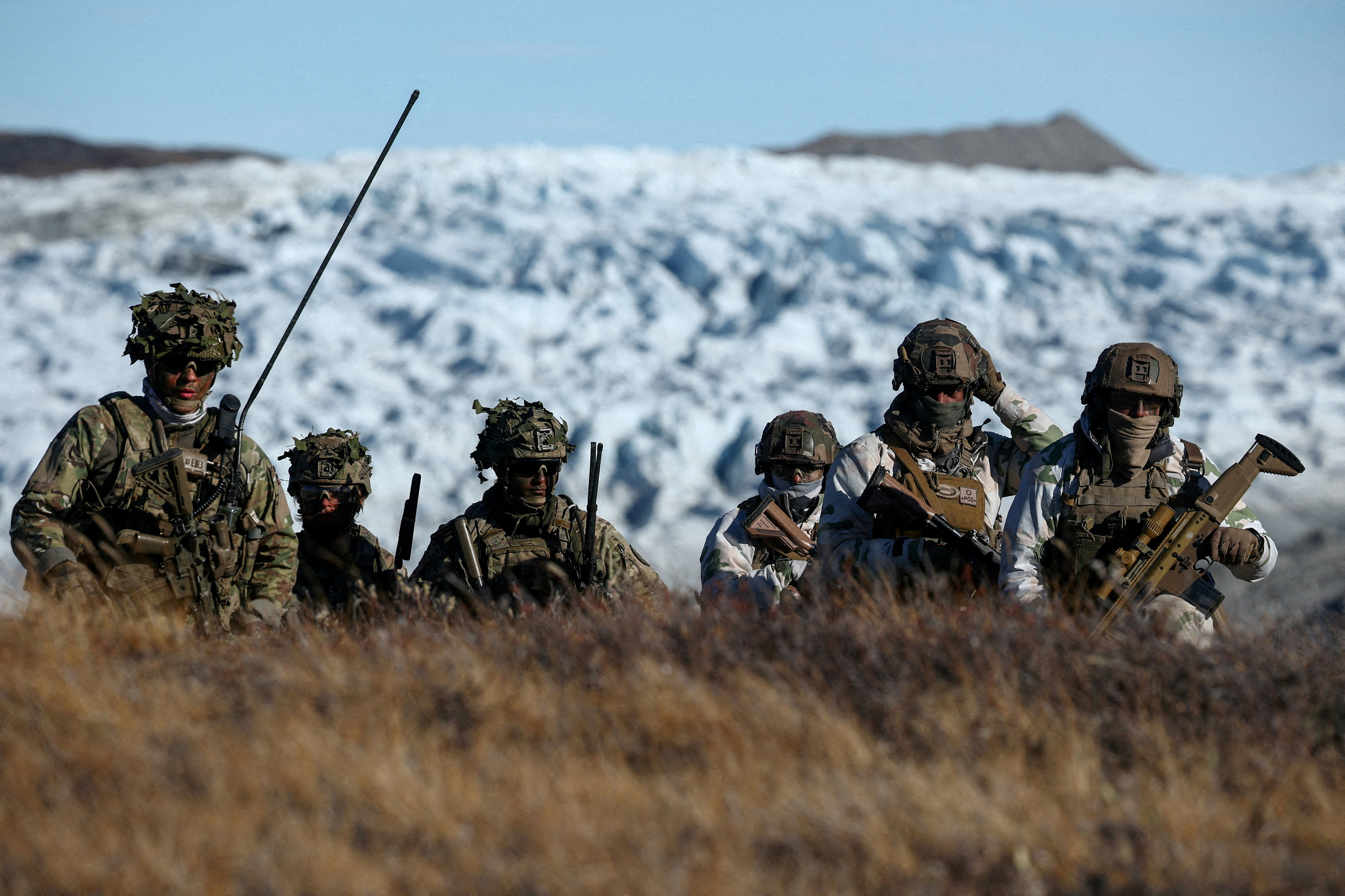 FILE PHOTO: Danish troops practice looking for potential threat