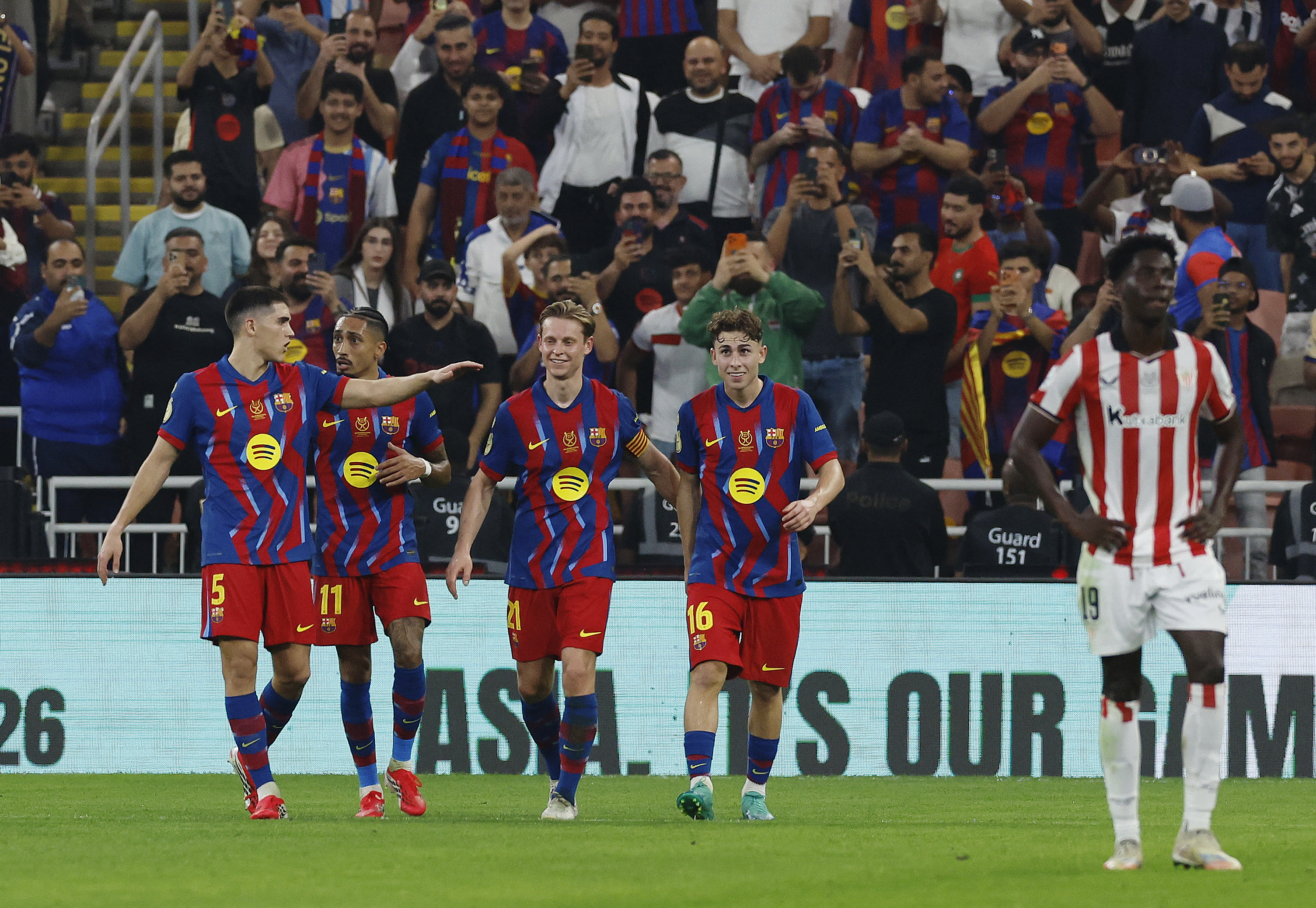 Soccer Football - Spanish Super Cup - Semi Final - FC Barcelona v Athletic Bilbao - King Abdullah Sports City, Jeddah, Saudi Arabia - January 7, 2026 FC Barcelona's Fermin Lopez celebrates scoring their second goal with Pau Cubarsi REUTERS/Vincent West