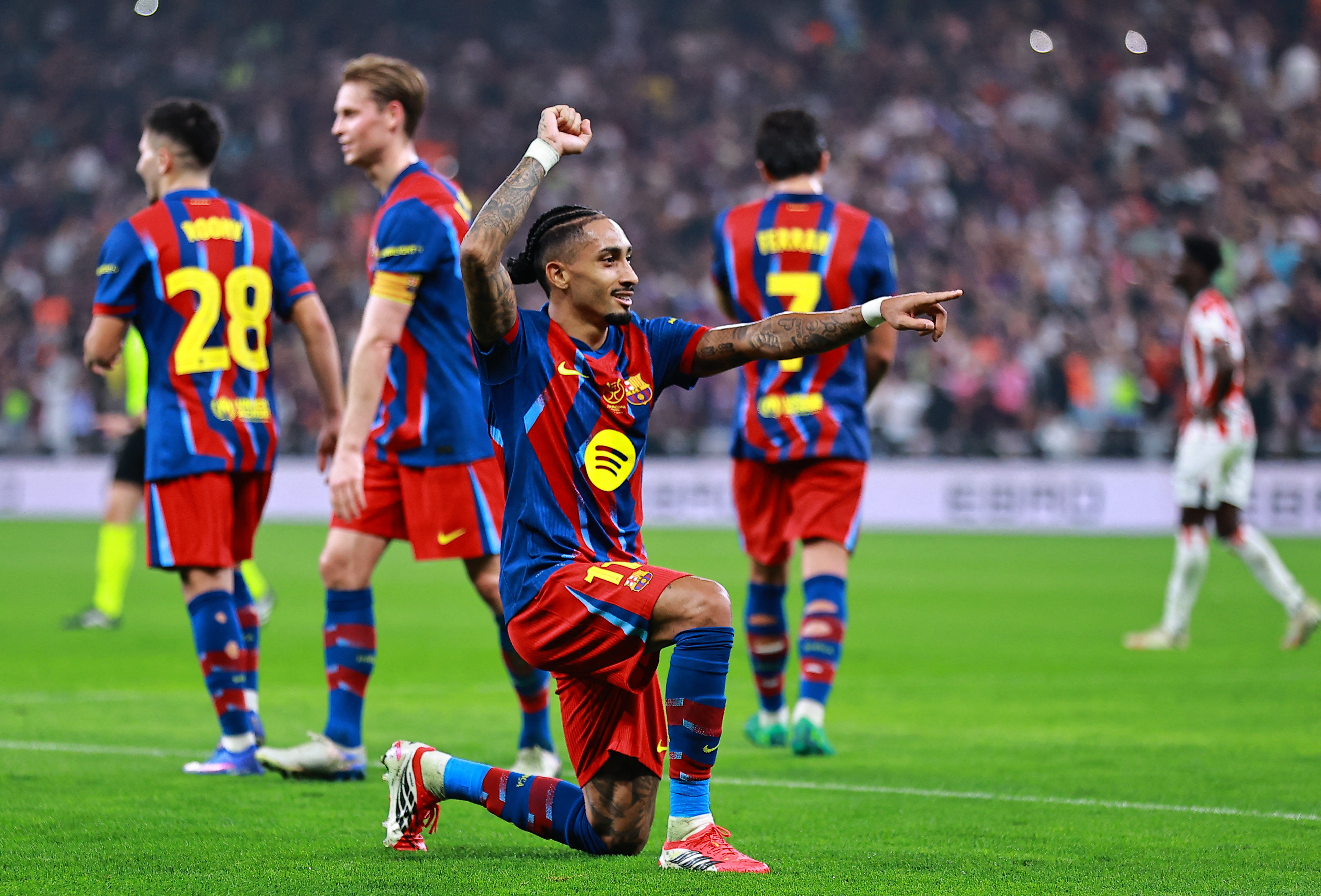 Soccer Football - Spanish Super Cup - Semi Final - FC Barcelona v Athletic Bilbao - King Abdullah Sports City, Jeddah, Saudi Arabia - January 7, 2026 FC Barcelona's Raphinha celebrates scoring their fourth goal REUTERS/Stringer