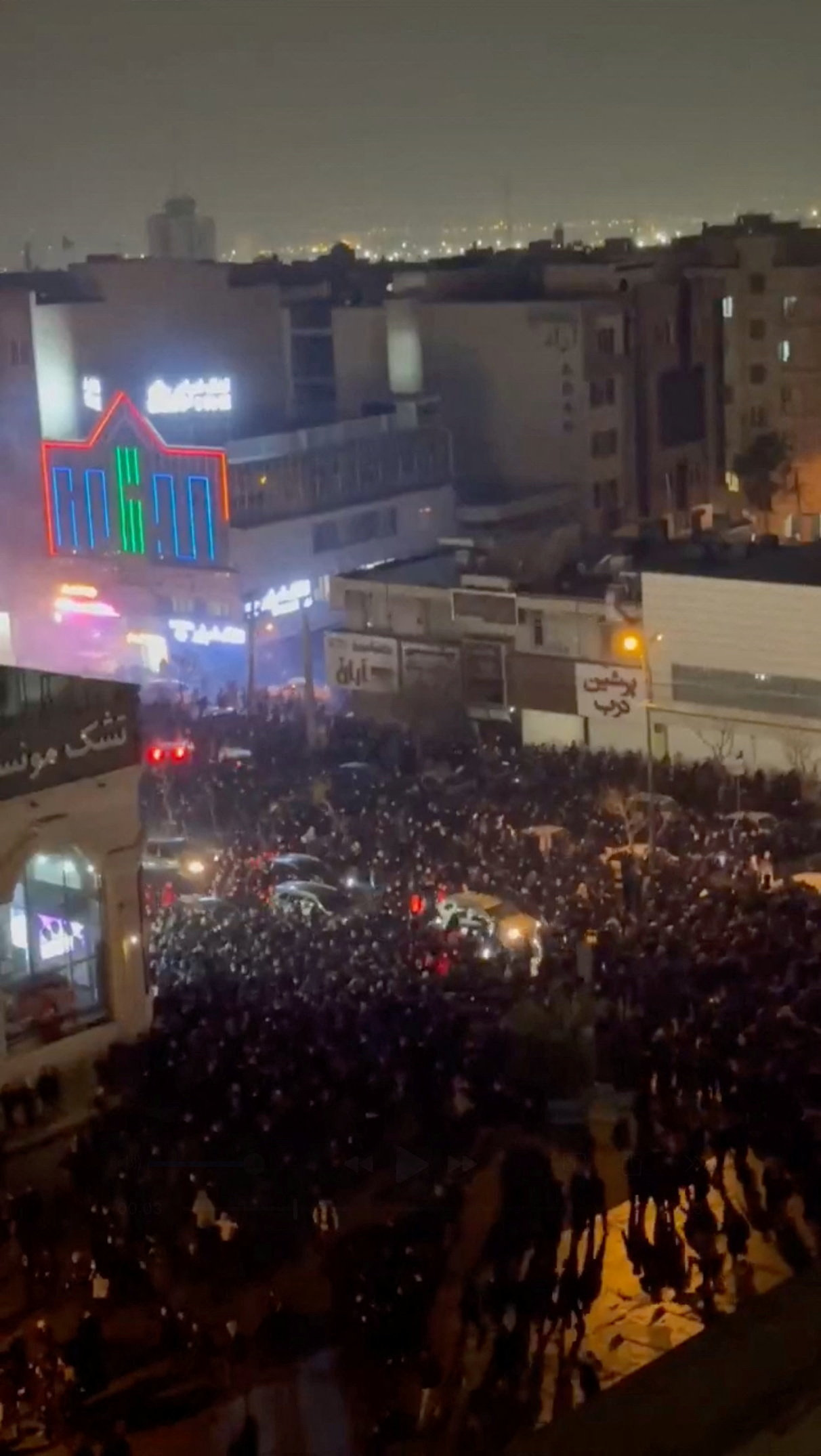 People gather on the streets amid anti-government unrest in Tehran, Iran (January 8).