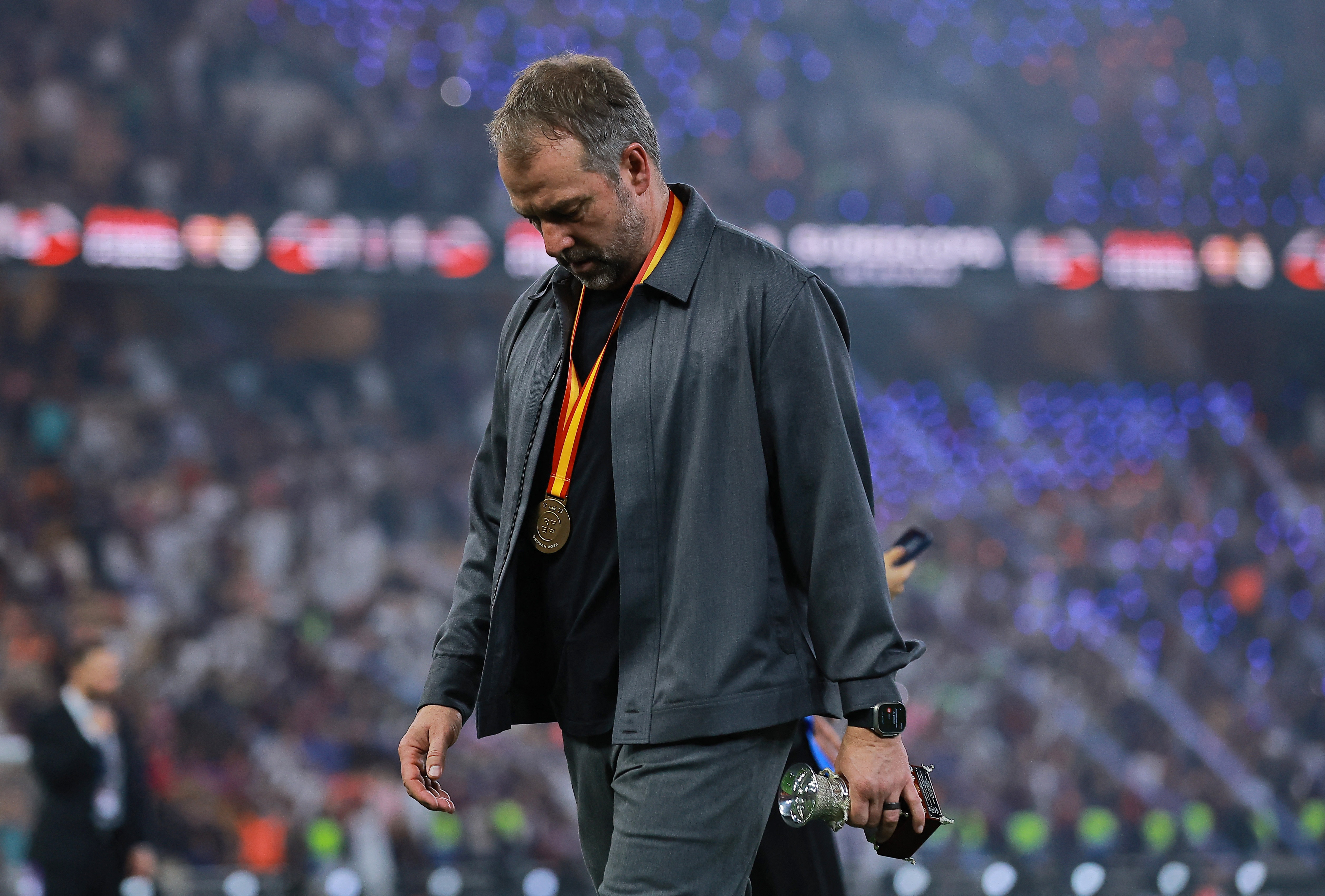 Soccer Football - Spanish Super Cup - Final - FC Barcelona v Real Madrid - King Abdullah Sports City Stadium, Jeddah, Saudi Arabia - January 12, 2026  FC Barcelona coach Hansi Flick after winning the Spanish Super Cup final REUTERS/Stringer