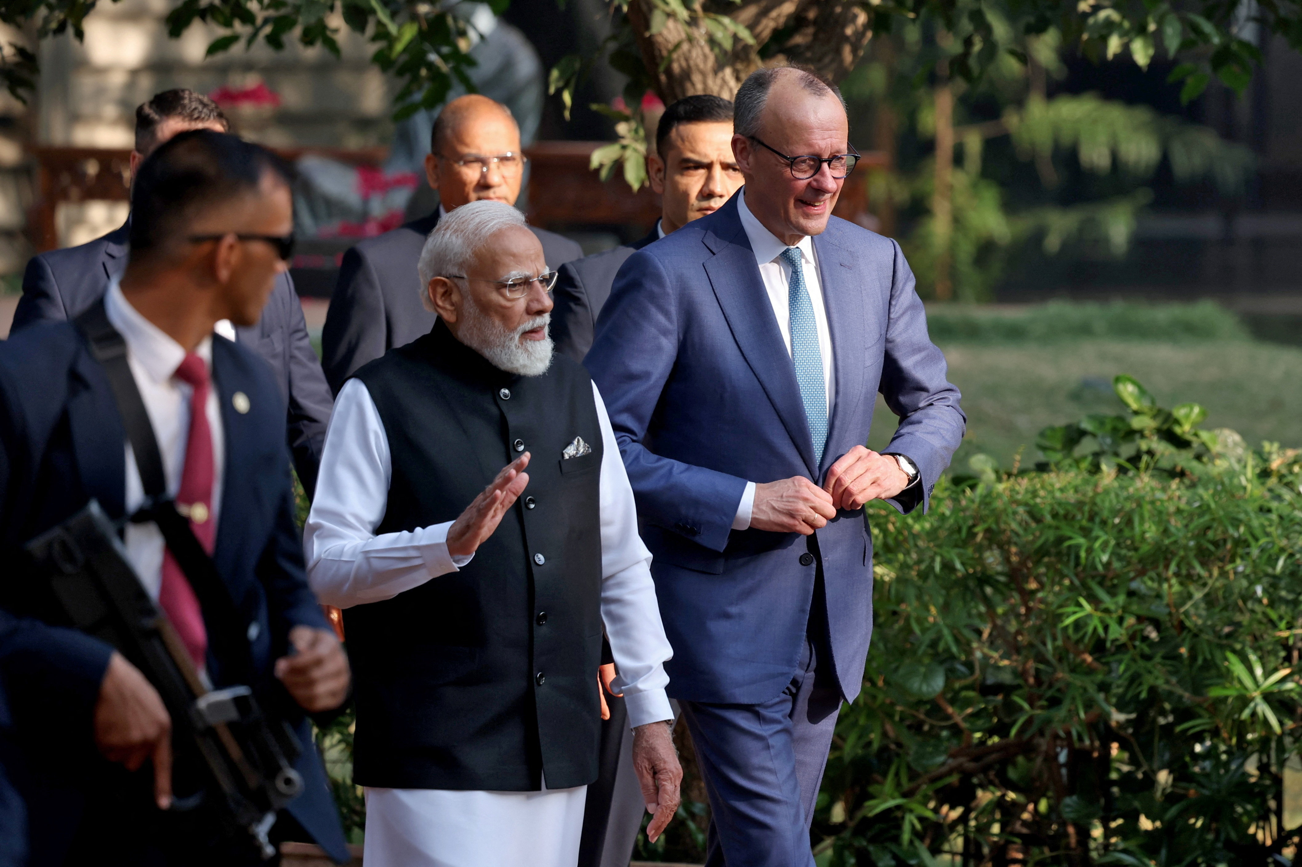 German Chancellor Friedrich Merz walks with India's Prime Minister Narendra Modi during his visit to Gandhi Ashram in Ahmedabad, India