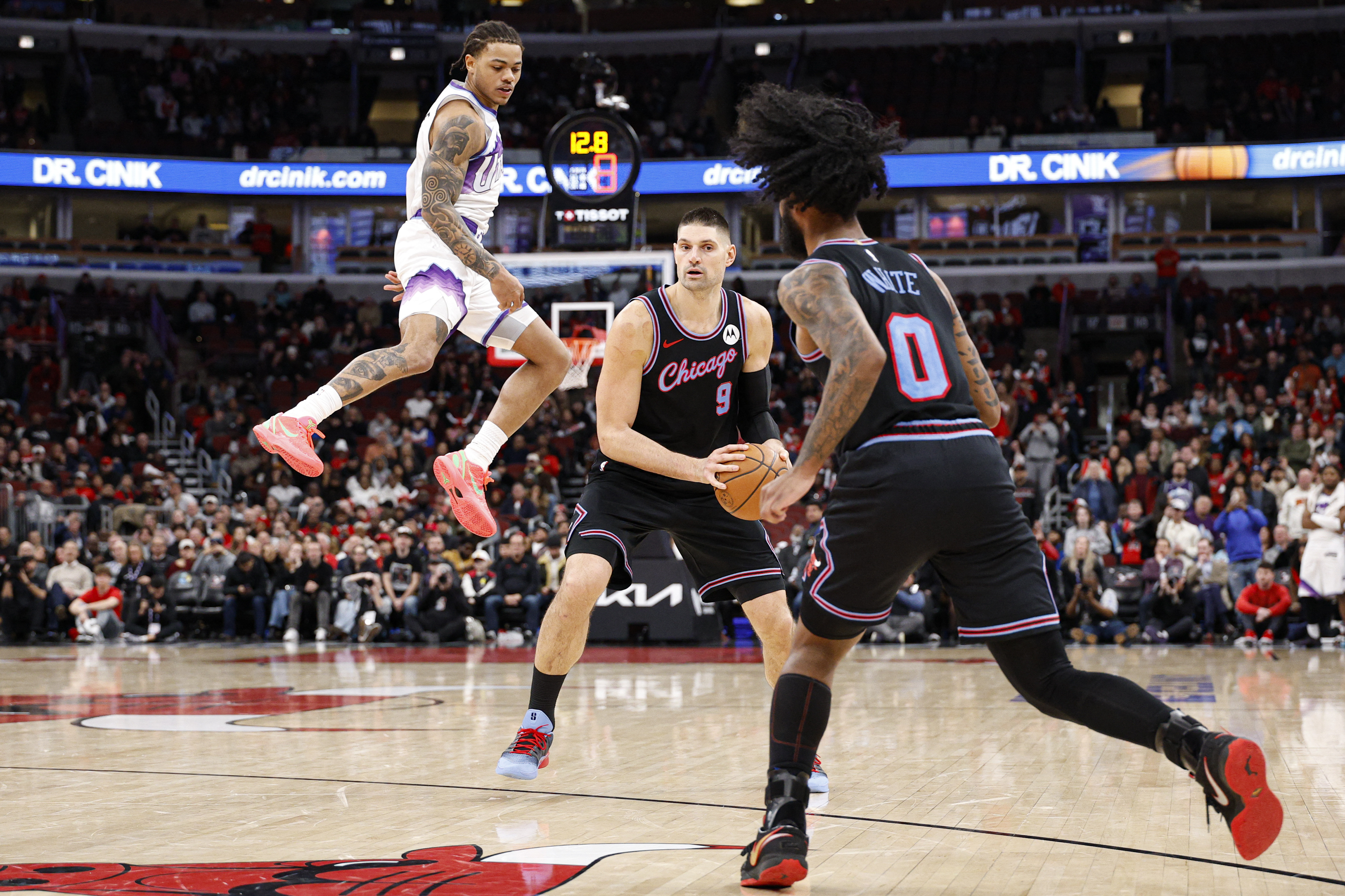Jan 14, 2026; Chicago, Illinois, USA; Chicago Bulls center Nikola Vucevic (9) looks to pass the ball against the Utah Jazz during the second half at United Center. Mandatory Credit: Kamil Krzaczynski-Imagn Images