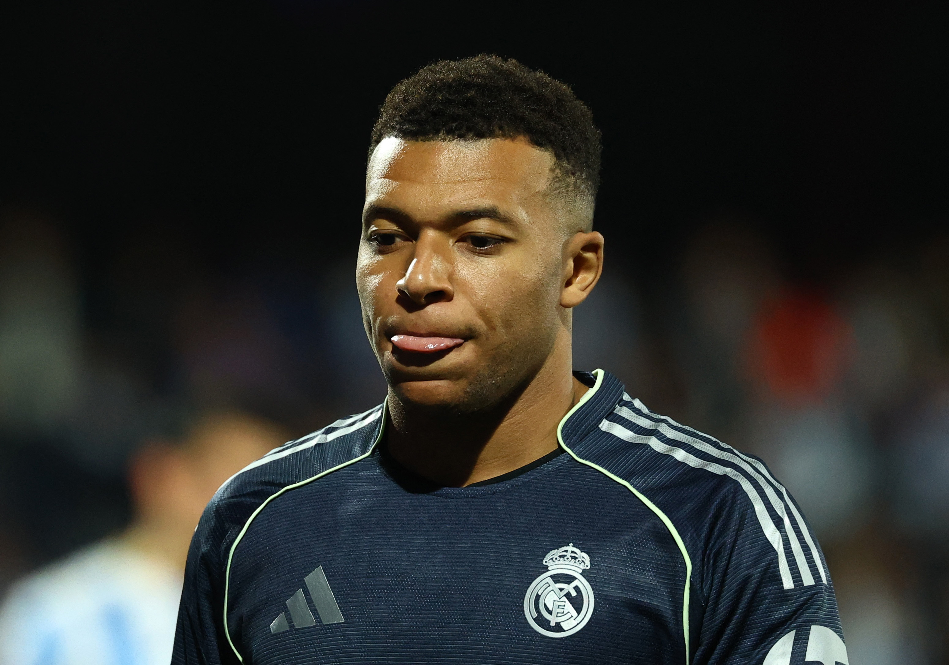 Soccer Football - Copa del Rey - Round of 32 - Talavera de la Reina v Real Madrid - Estadio El Prado, Talavera de la Reina, Spain - December 17, 2025 Real Madrid's Kylian Mbappe reacts REUTERS/Susana Vera
