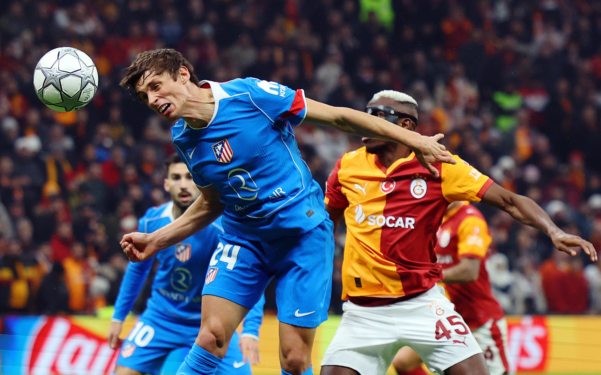 Soccer Football - UEFA Champions League - Galatasaray v Atletico Madrid - Rams Park, Istanbul, Turkey - January 21, 2026 Atletico Madrid's Robin Le Normand in action with Galatasaray's Victor Osimhen REUTERS/Murad Sezer