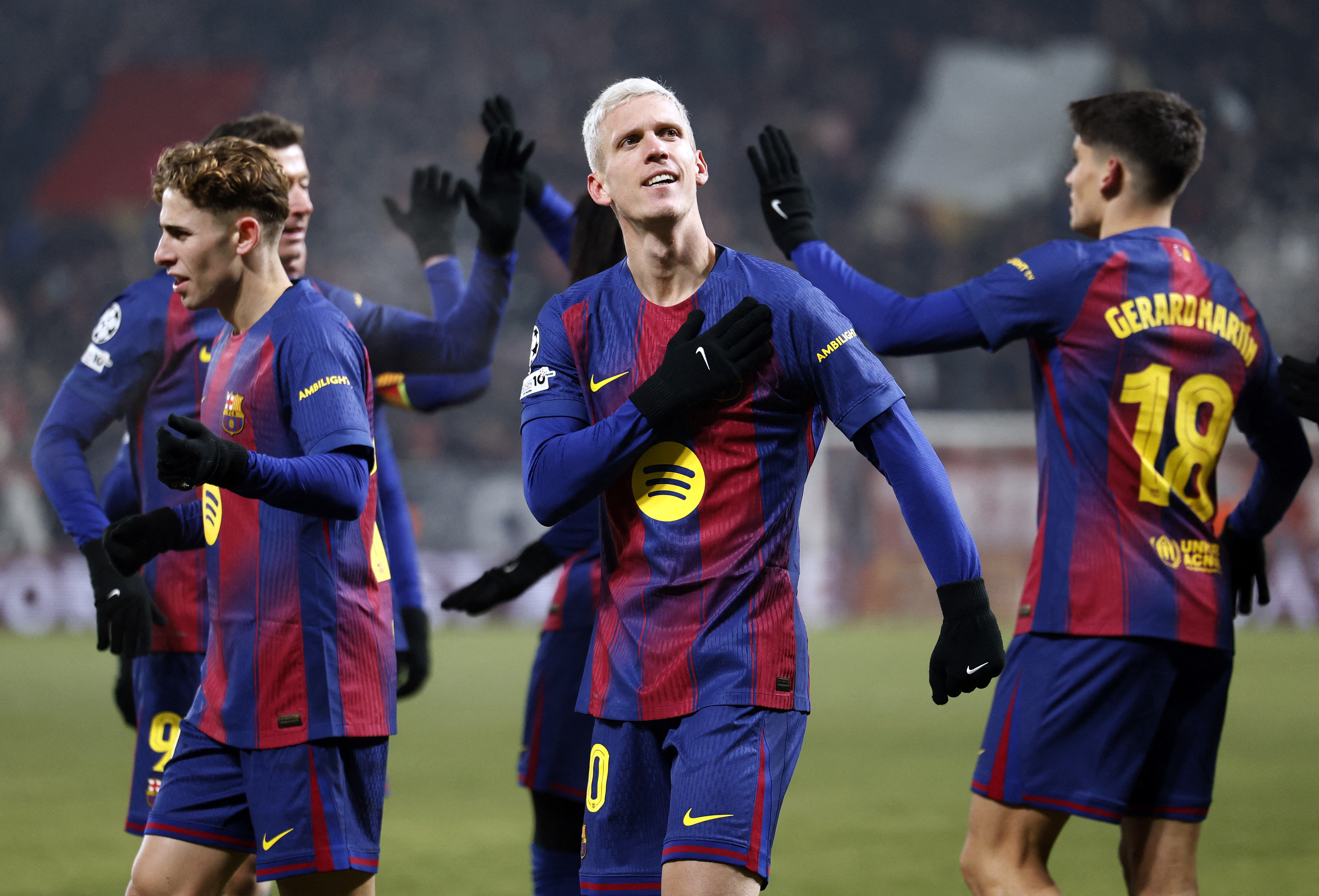 Soccer Football - UEFA Champions League - Slavia Prague v FC Barcelona - Fortuna Arena, Prague, Czech Republic - January 21, 2026 FC Barcelona's Dani Olmo celebrates scoring their third goal with teammates REUTERS/David W Cerny