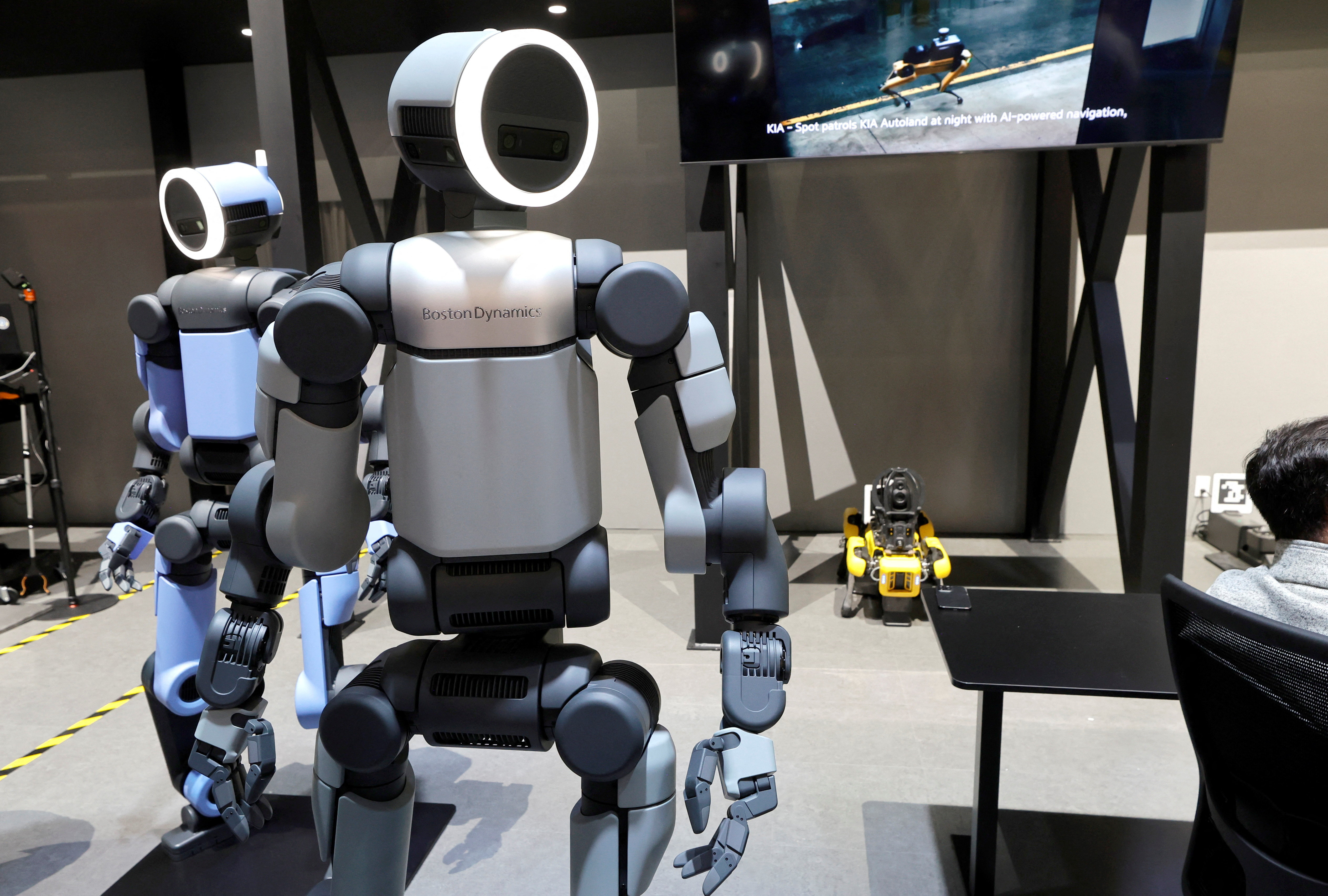 Boston Dynamics Atlas robots are displayed in the Hyundai Motor Group booth during CES 2026