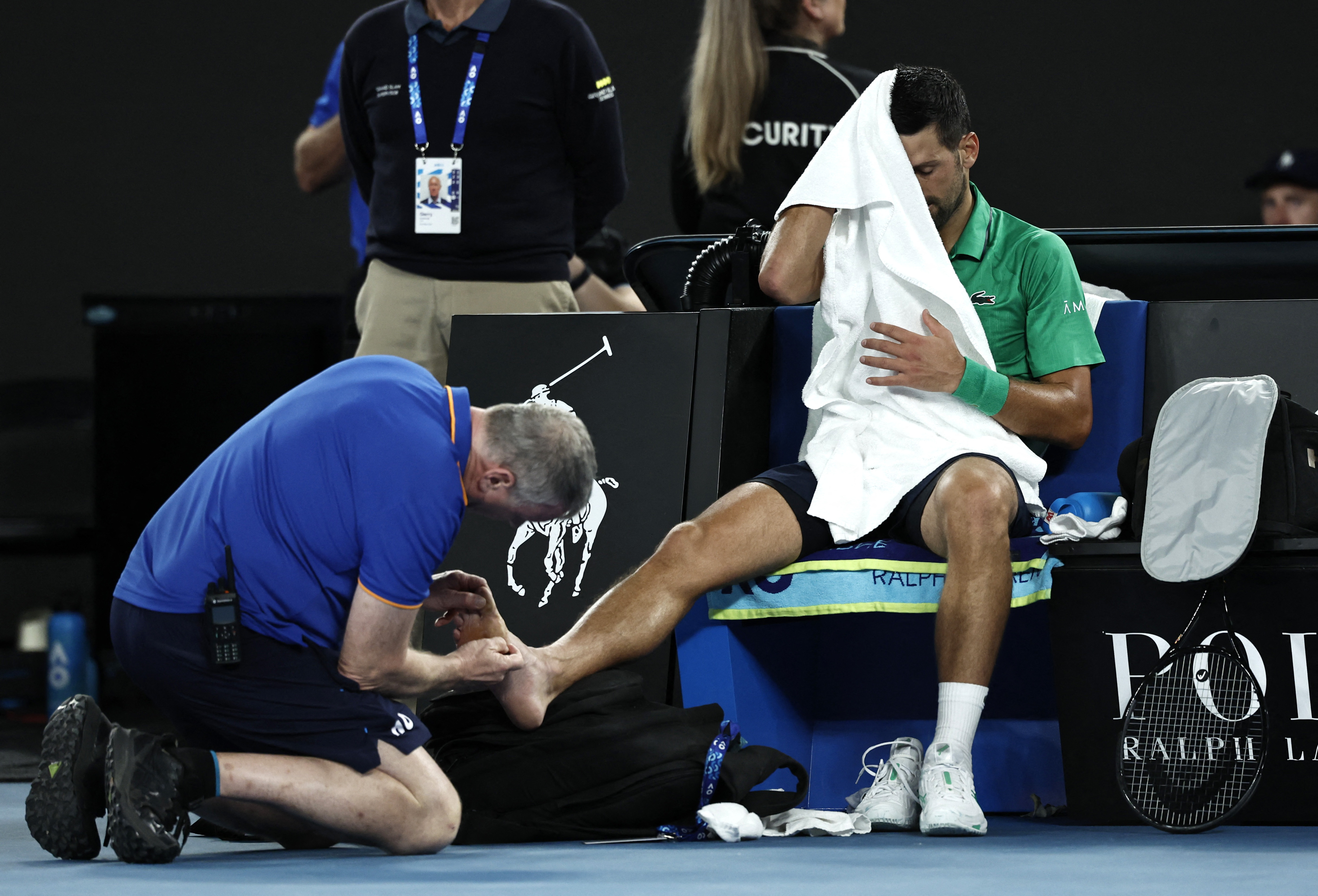 Tennis - Australian Open - Melbourne Park, Melbourne, Australia - January 24, 2026 Serbia's Novak Djokovic receives medical attention during his third round match against Netherlands' Botic van de Zandschulp REUTERS/Tingshu Wang