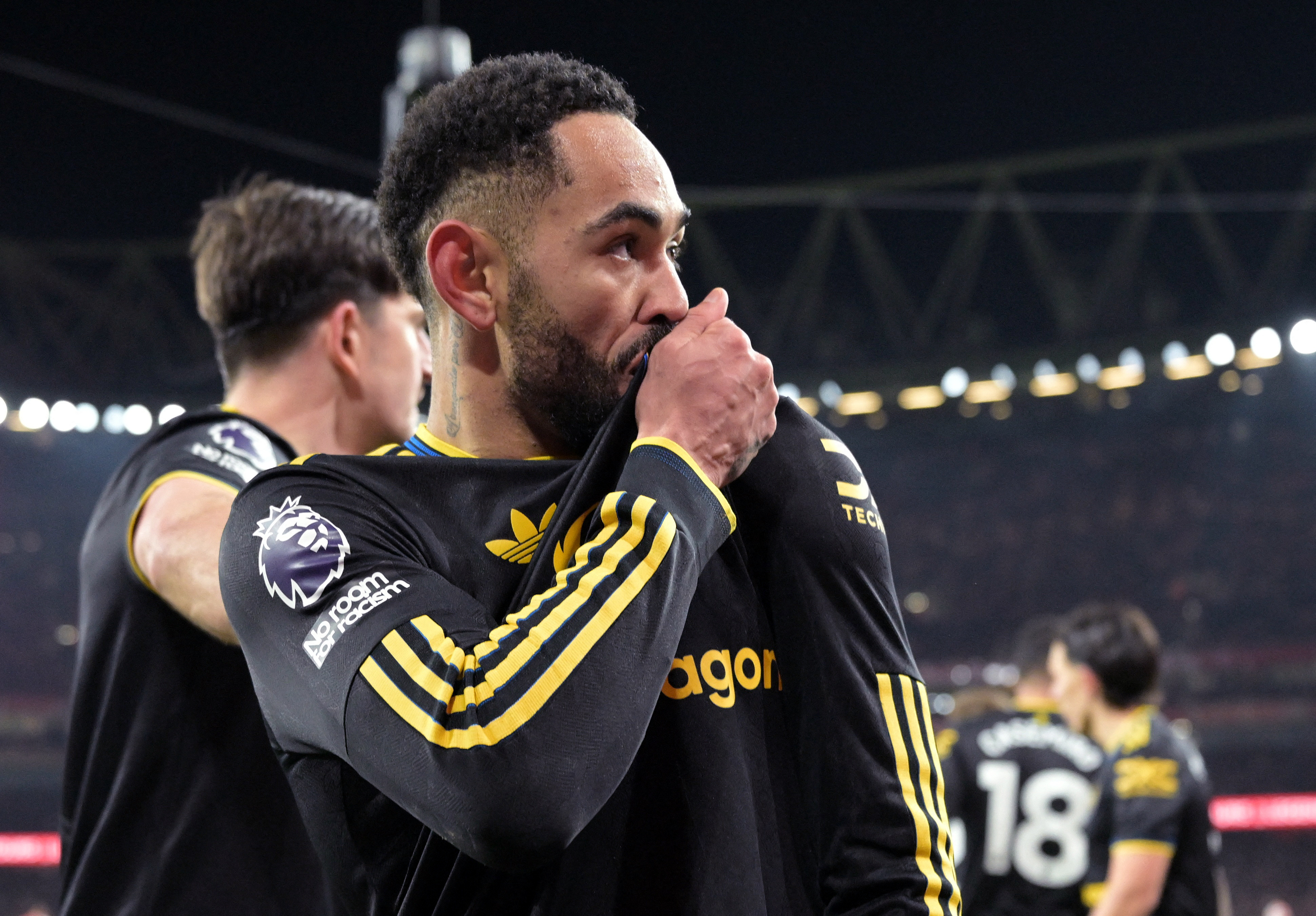 Soccer Football - Premier League - Arsenal v Manchester United - Emirates Stadium, London, Britain - January 25, 2026 Manchester United's Matheus Cunha celebrates scoring their third goal REUTERS/Dylan Martinez EDITORIAL USE ONLY. NO USE WITH UNAUTHORIZED