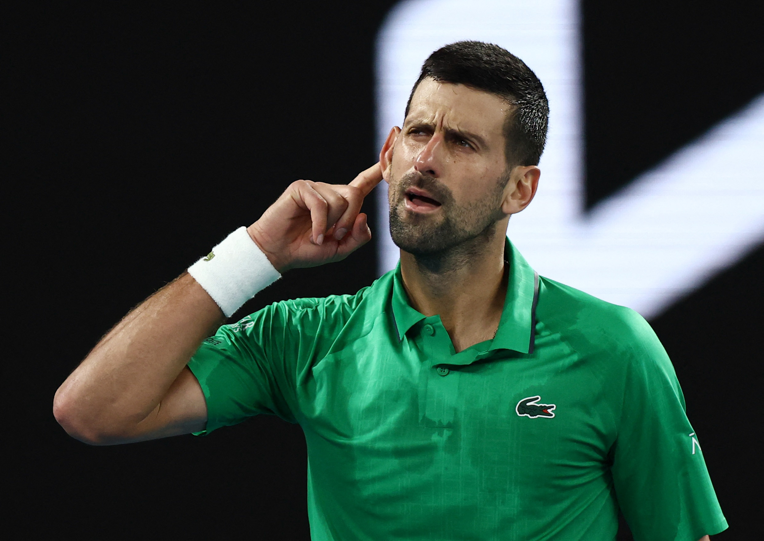 Tennis - Australian Open - Melbourne Park, Melbourne, Australia - January 24, 2026 Serbia's Novak Djokovic celebrates after winning his third round match against Netherlands' Botic van de Zandschulp REUTERS/Tingshu Wang