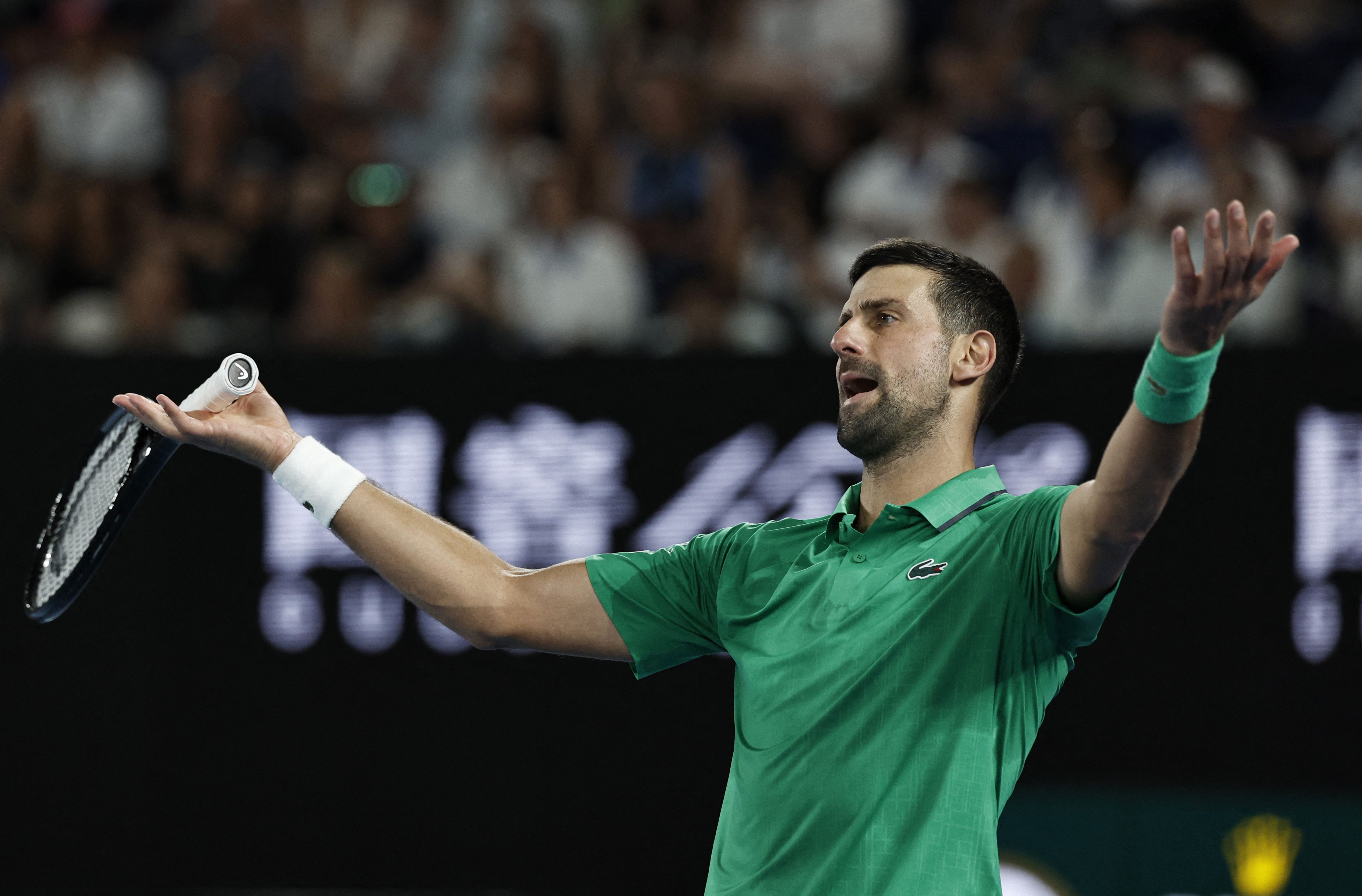 Tennis - Australian Open - Melbourne Park, Melbourne, Australia - January 24, 2026 Serbia's Novak Djokovic reacts during his third round match against Netherlands' Botic van de Zandschulp REUTERS/Tingshu Wang