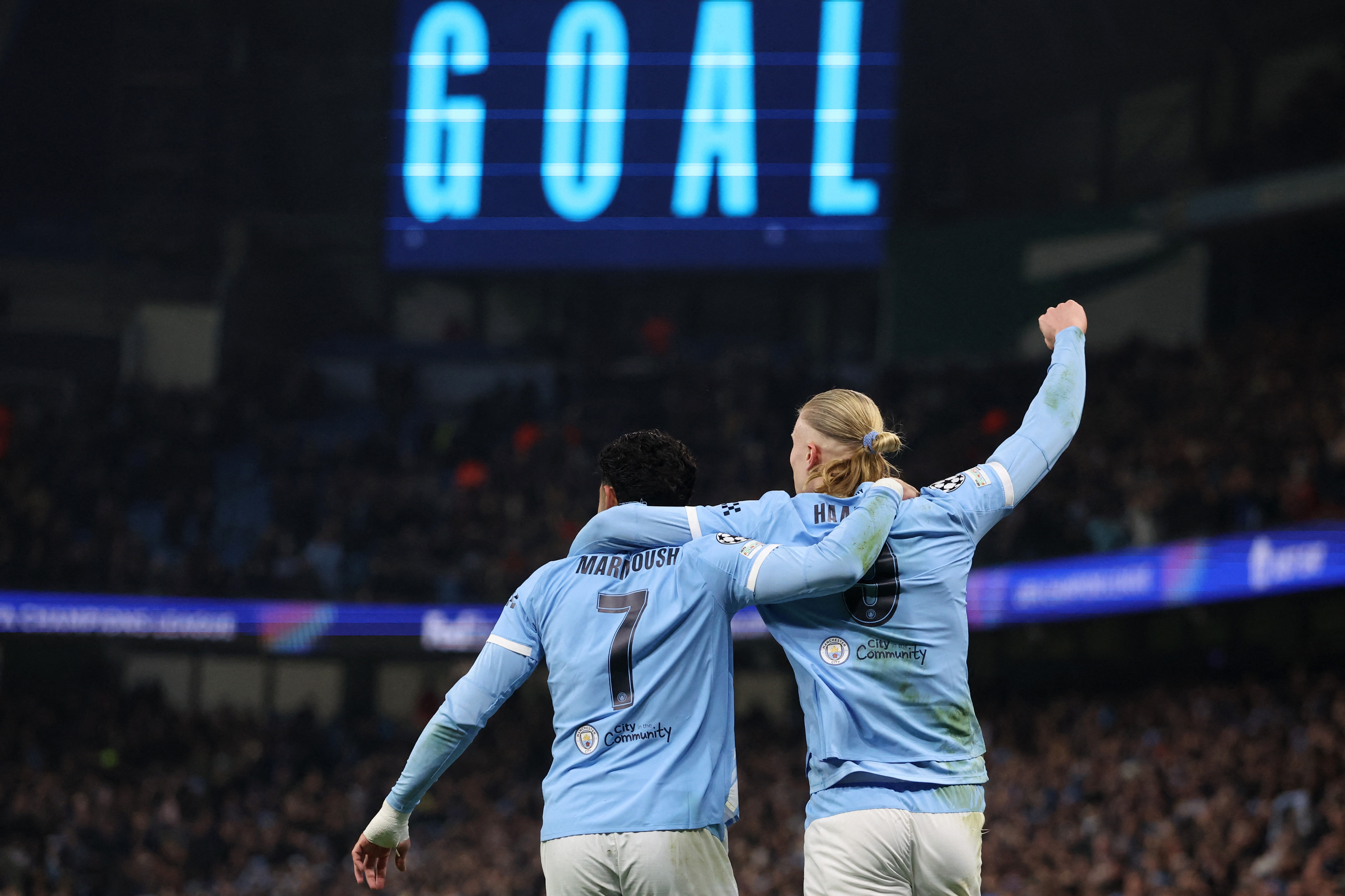 Soccer Football - UEFA Champions League - Manchester City v Galatasaray - Etihad Stadium, Manchester, Britain - January 28, 2026 Manchester City's Erling Haaland celebrates scoring their first goal with Omar Marmoush REUTERS/Scott Heppell
