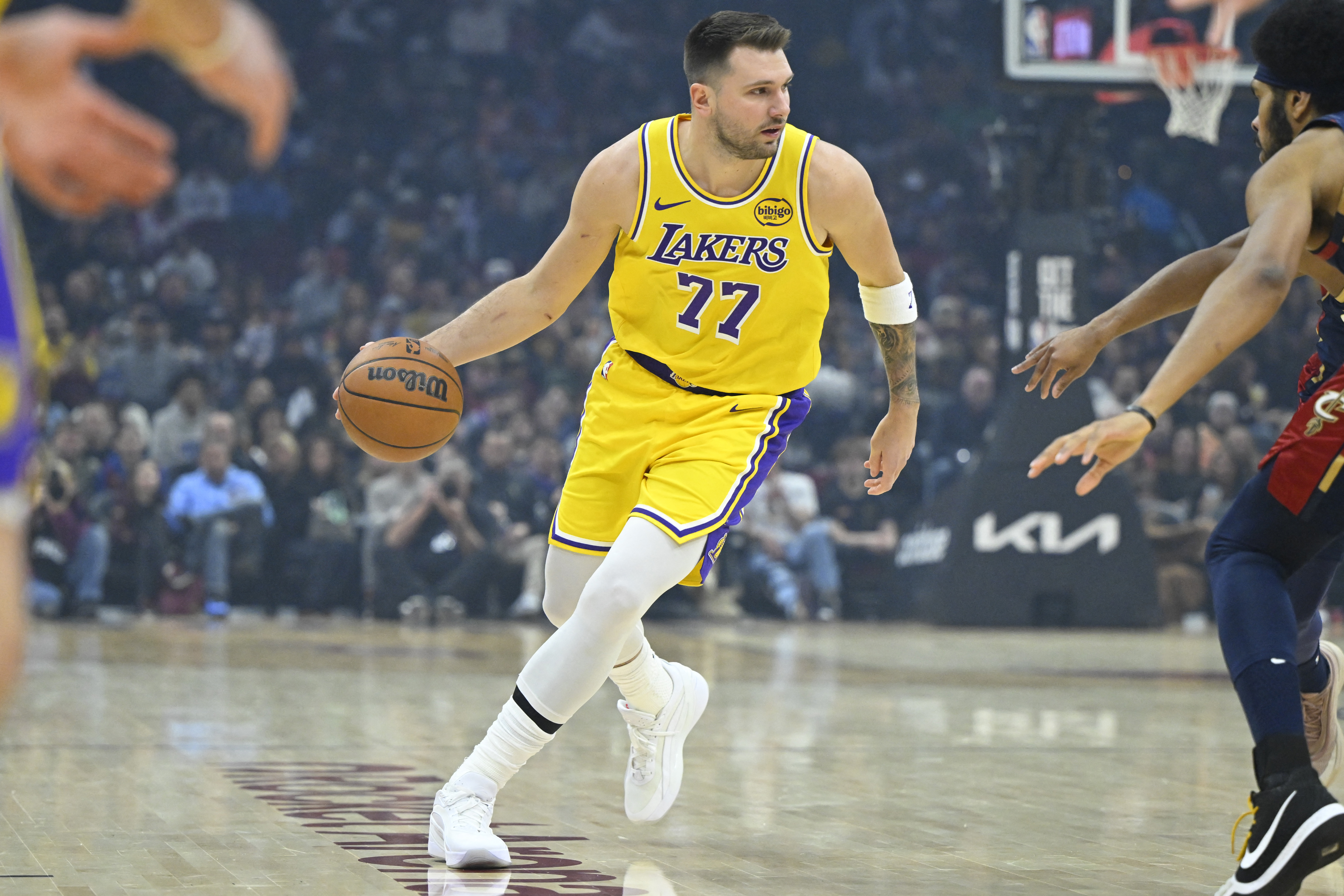 Jan 28, 2026; Cleveland, Ohio, USA; Los Angeles Lakers guard Luka Doncic (77) dribbles the ball in the first quarter against the Cleveland Cavaliers at Rocket Arena. Mandatory Credit: David Richard-Imagn Images