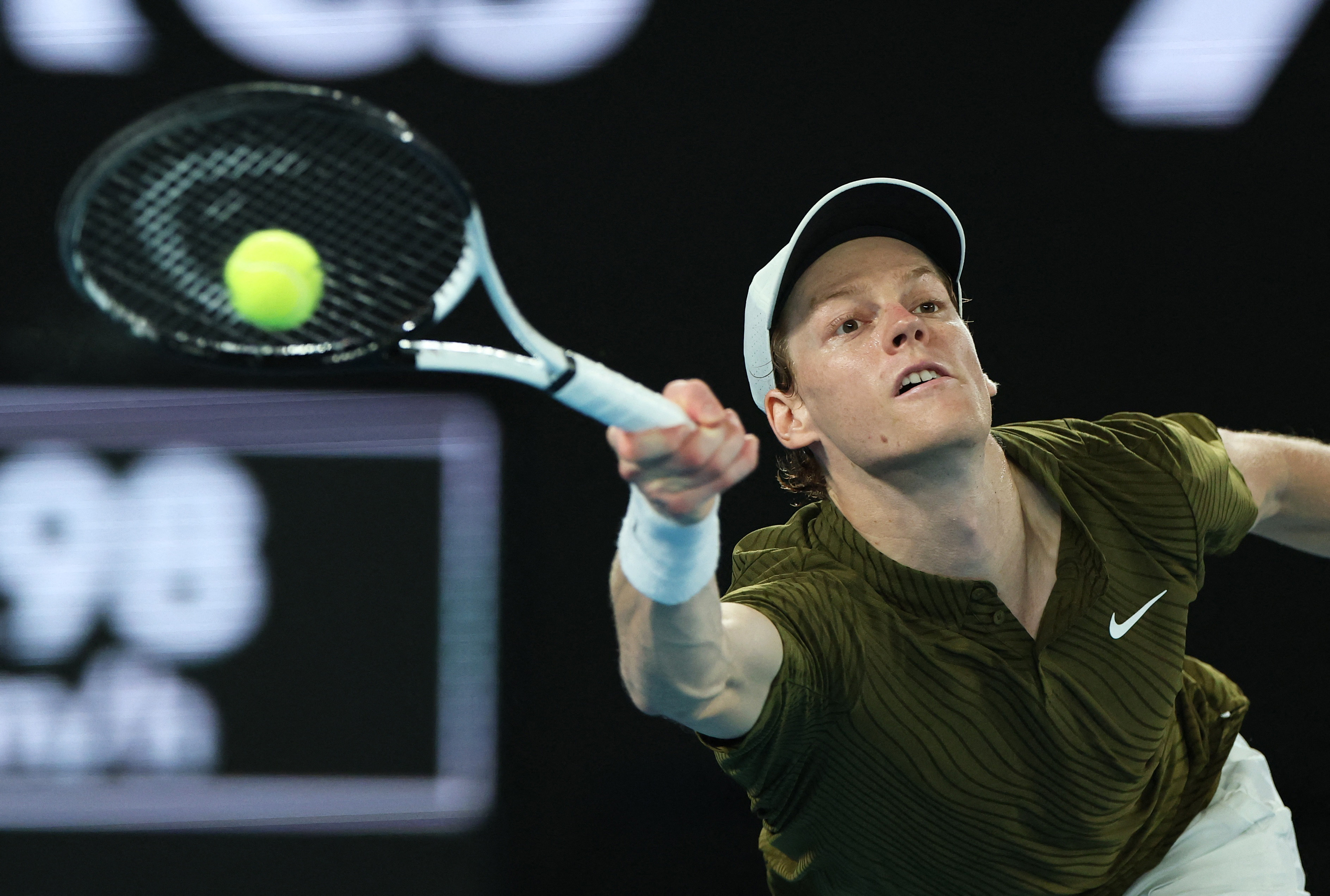 Tennis - Australian Open - Melbourne Park, Melbourne, Australia - January 30, 2026 Italy's Jannik Sinner in action during his semi final match against Serbia's Novak Djokovic REUTERS/Edgar Su