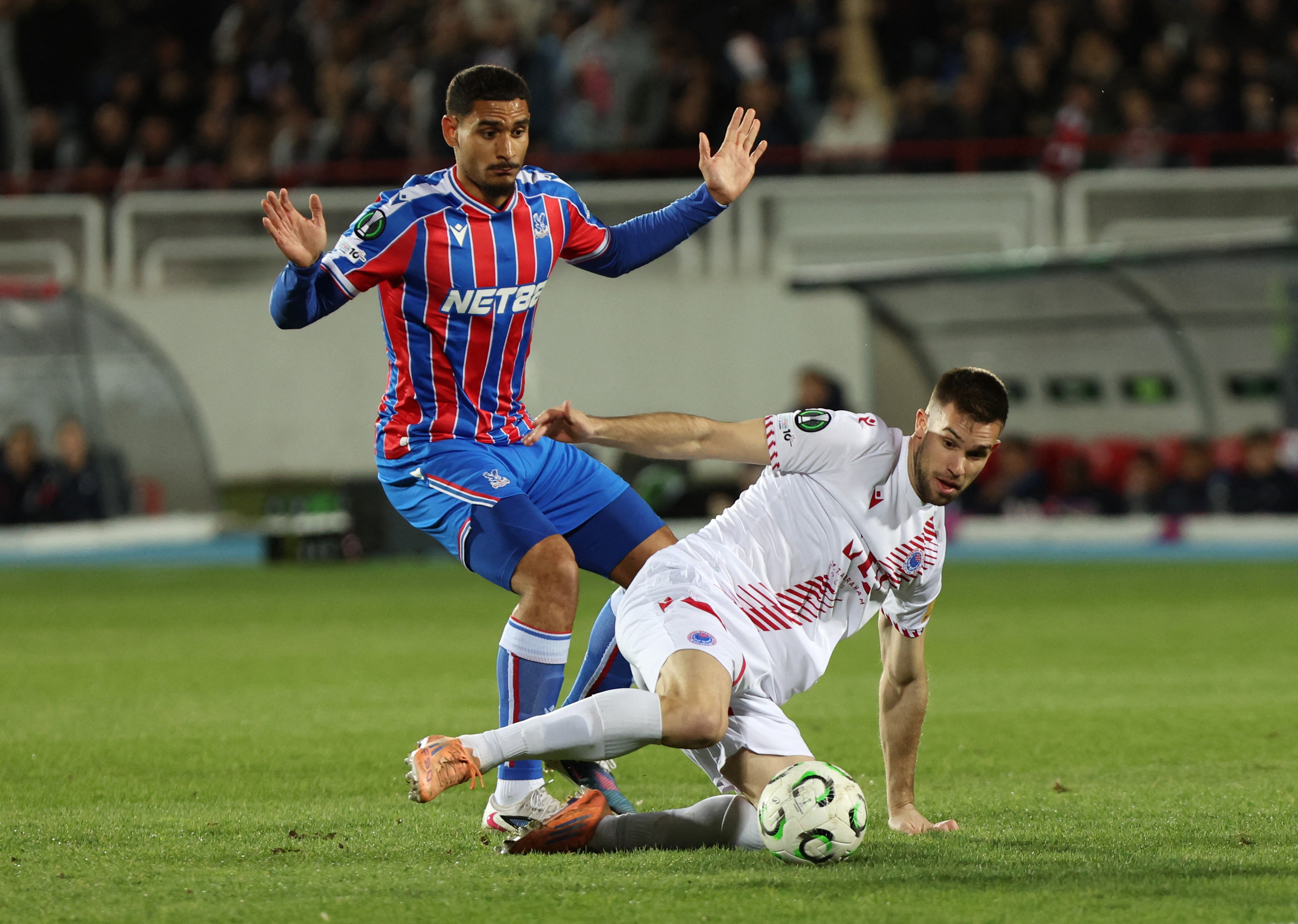 Soccer Football - UEFA Conference League - Play Off - First Leg - Zrinjski Mostar v Crystal Palace - HSK Zrinjski Stadium, Mostar, Bosnia and Herzegovina - February 19, 2026 Crystal Palace's Maxence Lacroix in action with Zrinjski Mostar's Marko Vranjkovi