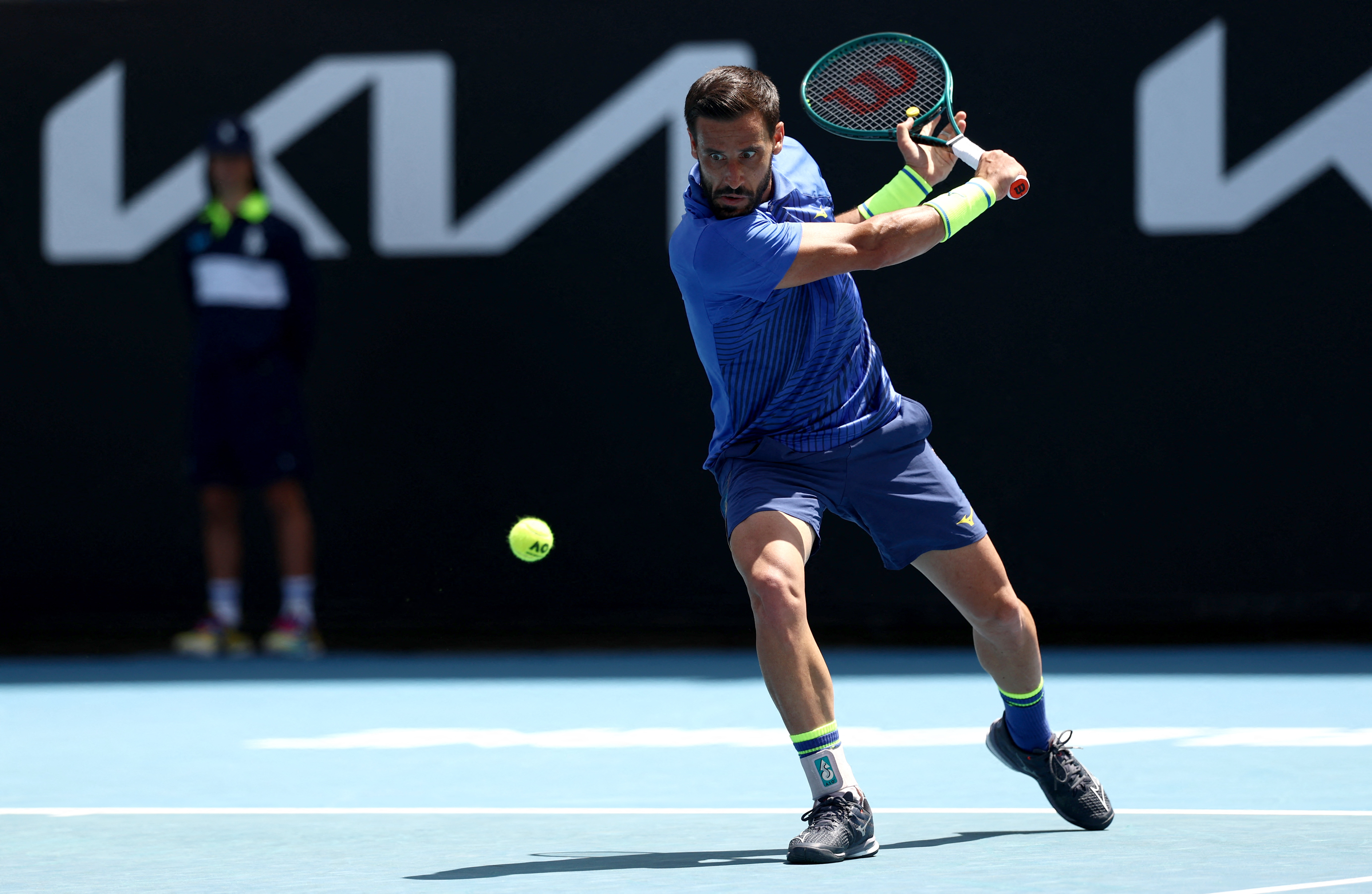 Tennis - Australian Open - Melbourne Park, Melbourne, Australia - January 21, 2026 Bosnia's Damir Dzumhur in action during his second round match against Argentina's Francisco Cerundolo REUTERS/Tingshu Wang