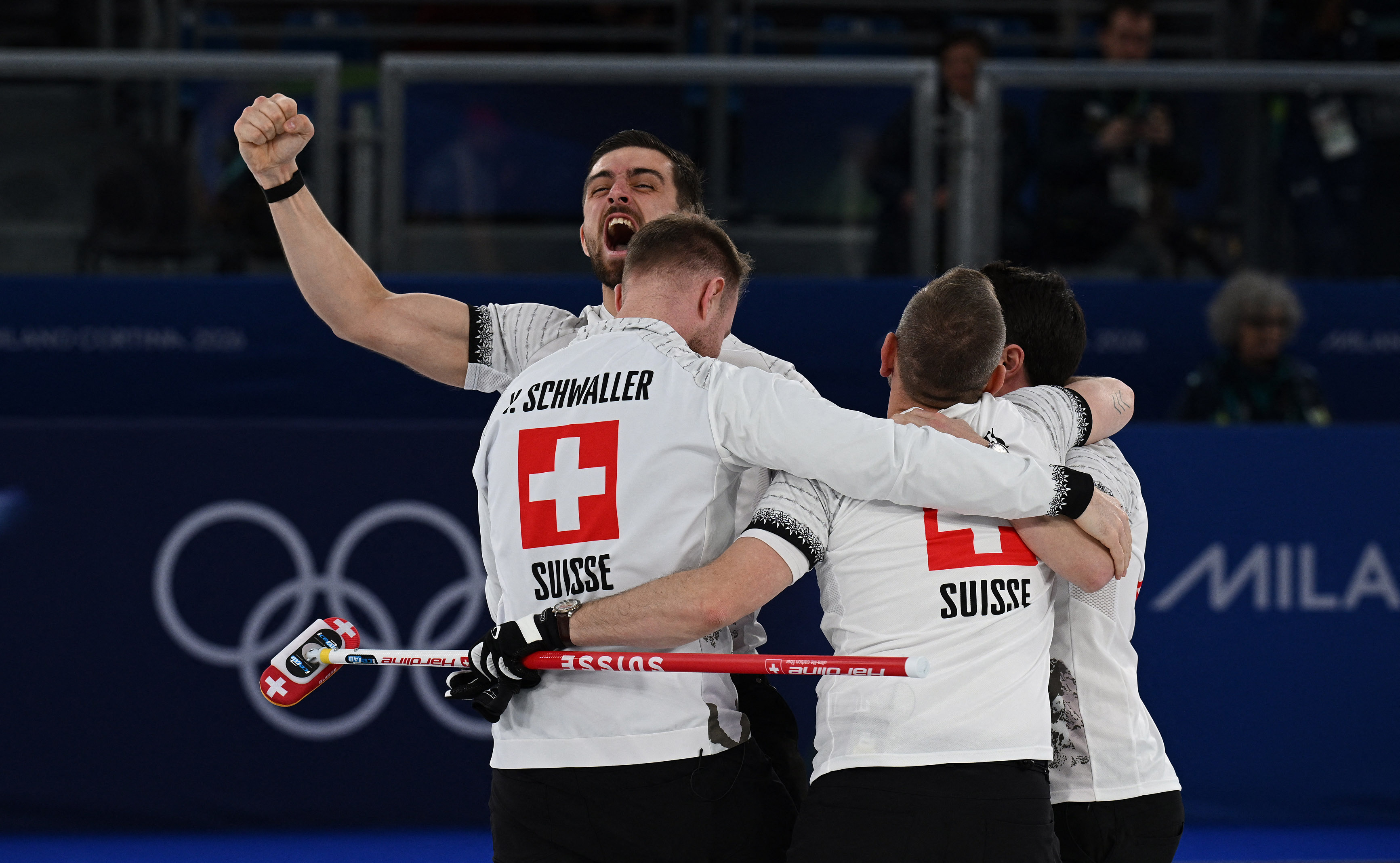 2026-02-20T204053Z_725455951_UP1EM2K1LG4MZ_RTRMADP_3_OLYMPICS-2026-CURLING