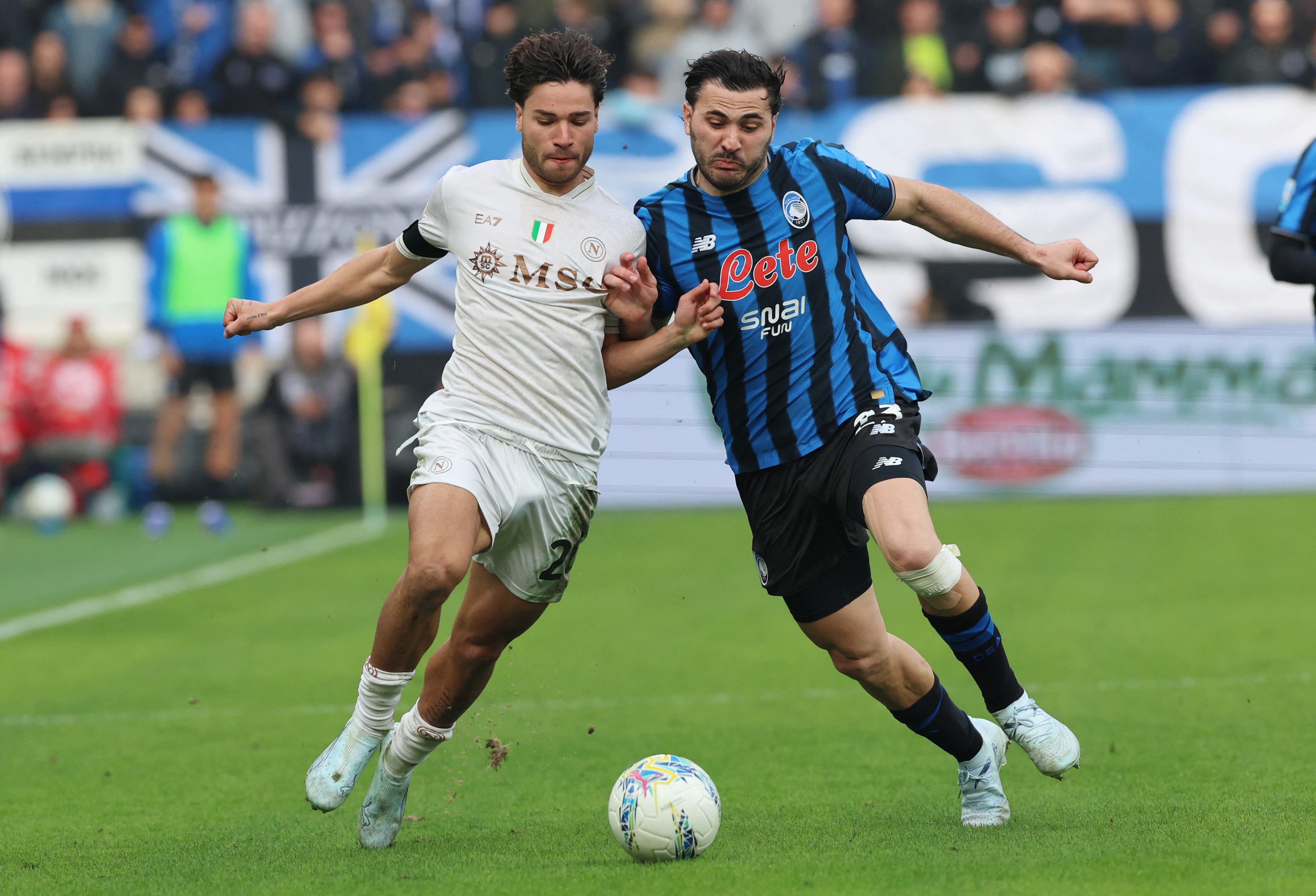 Soccer Football - Serie A - Atalanta v Napoli - New Balance Arena, Bergamo, Italy - February 22, 2026 Atalanta's Sead Kolasinac in action with Napoli's Antonio Vergara REUTERS/Ciro De Luca