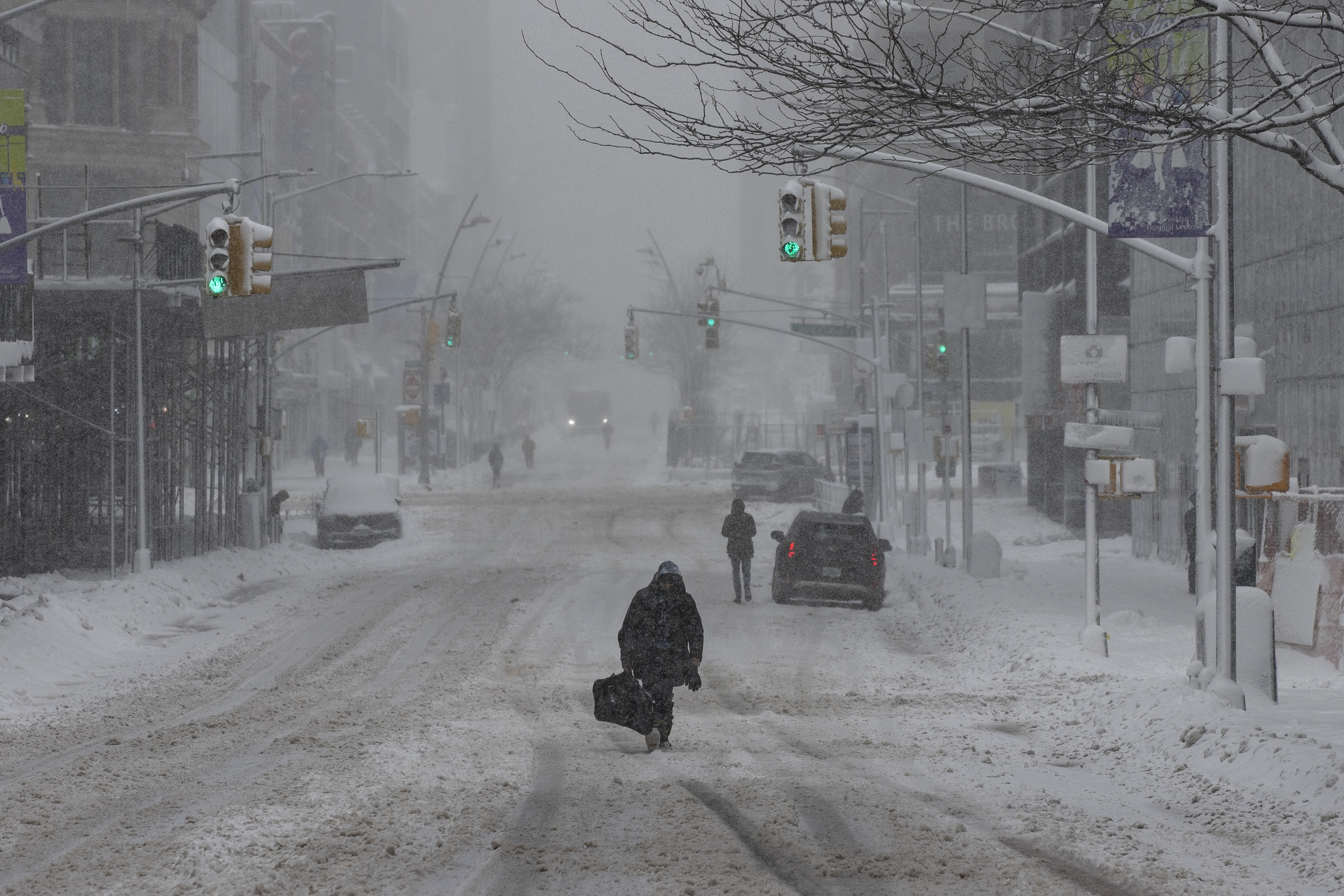 NEW YORK, NEW YORK - FEBRUARY 23: People walk through the snow during a blizzard in Brooklyn, New York, U.S., February 23, 2026. ( Mostafa Bassim - Anadolu Agency )