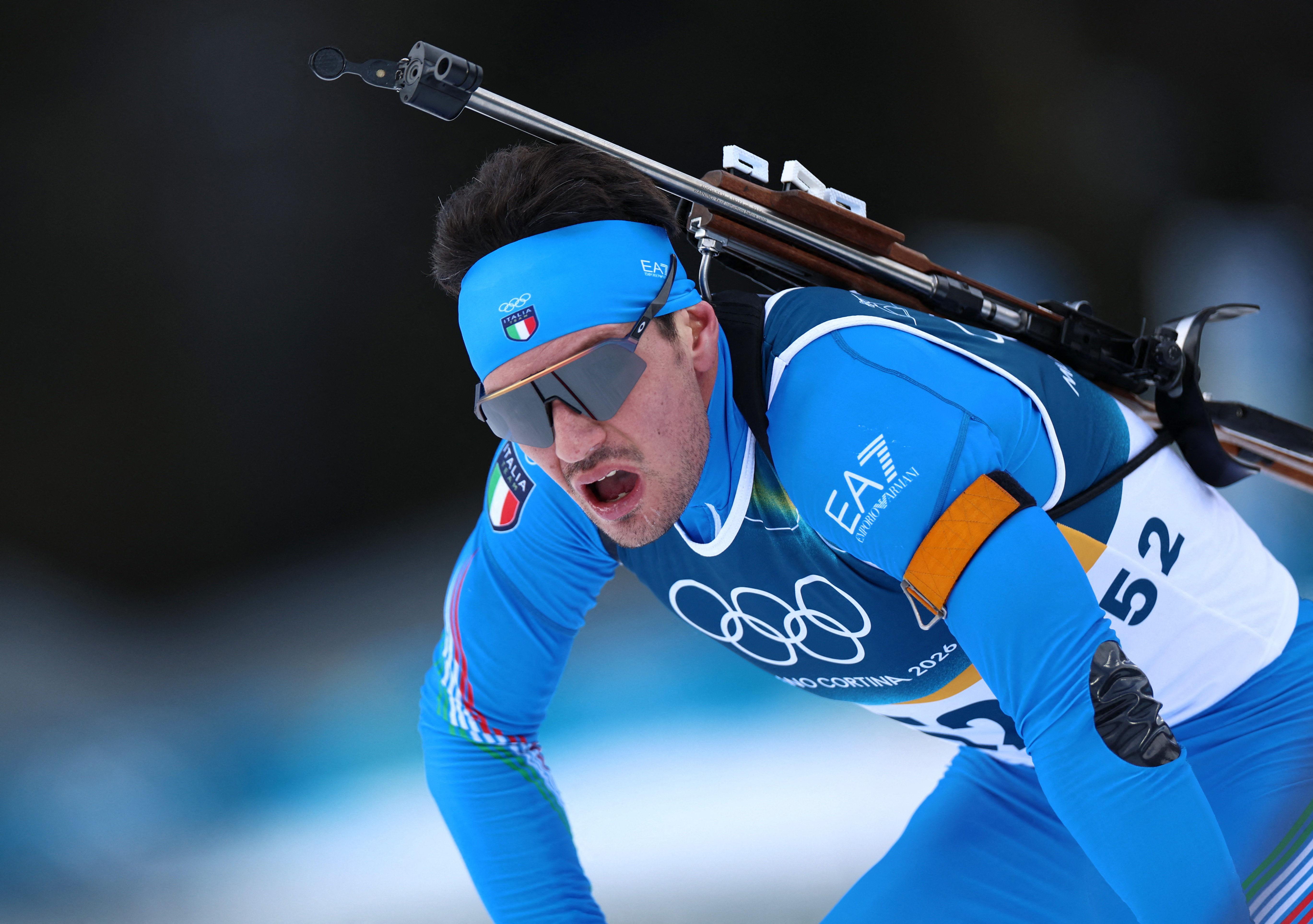 Milano Cortina 2026 Olympics - Biathlon - Men's 20km Individual - Anterselva Biathlon Arena, South Tyrol, Italy - February 10, 2026.  Tommaso Giacomel of Italy reacts after crossing the line REUTERS/Eloisa Lopez