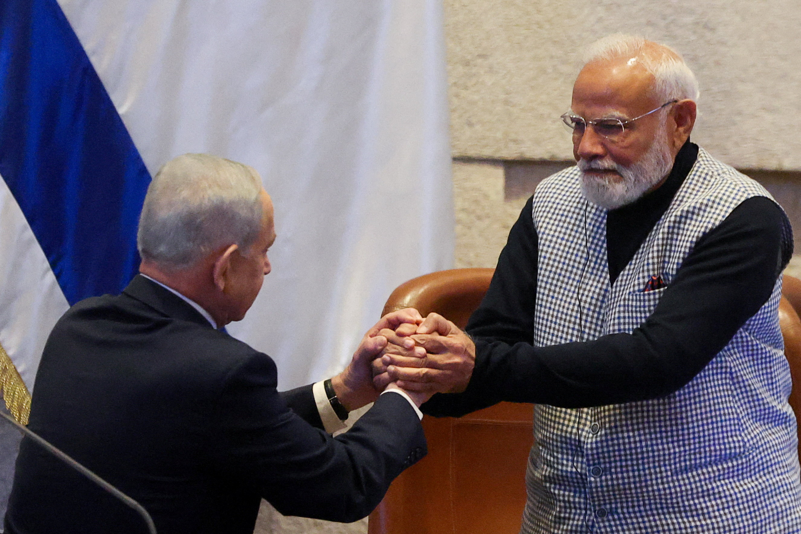 Israel's Prime Minister Benjamin Netanyahu greets India's Prime Minister
