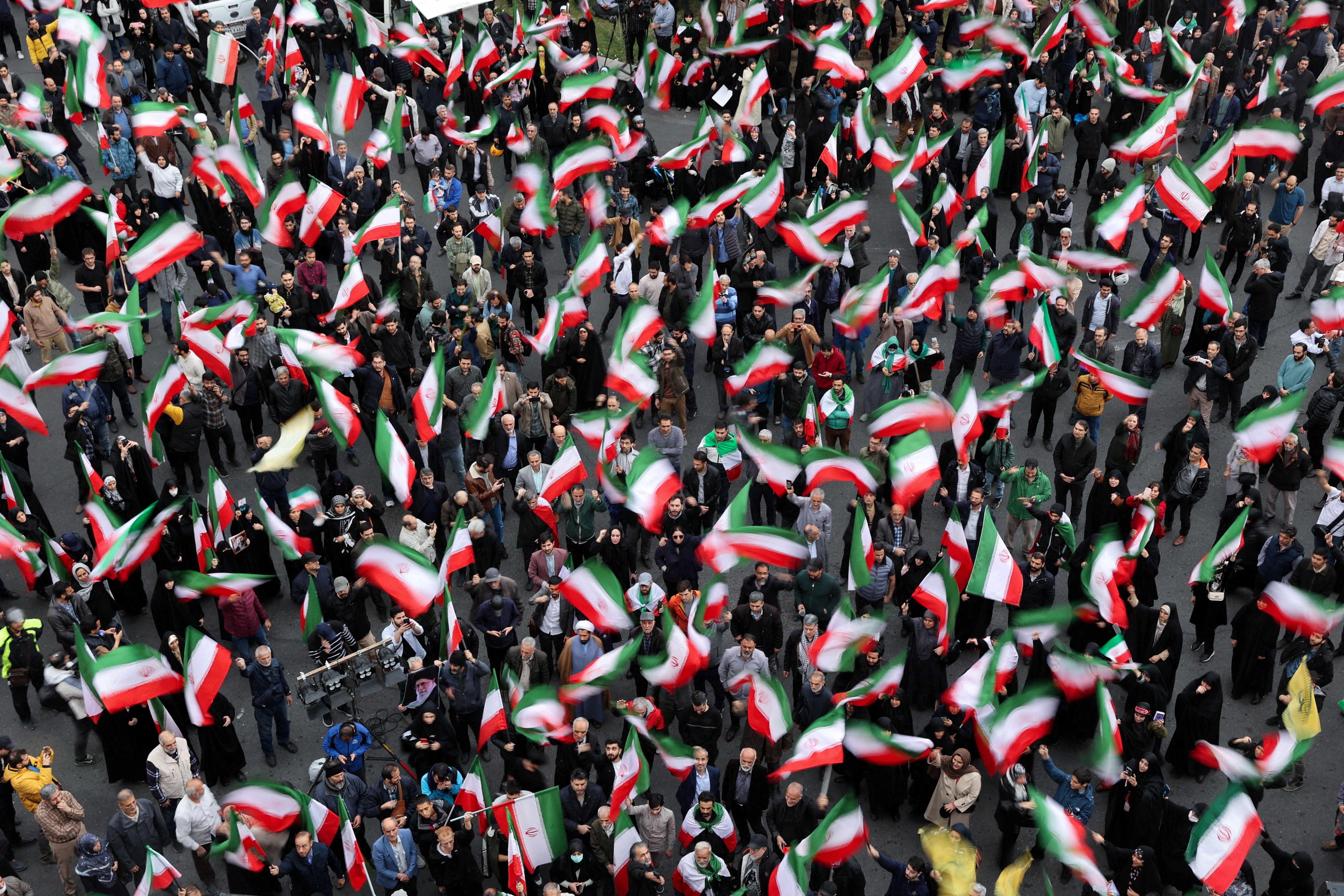 Iranian demonstrators protest against the U.S.-Israeli strikes, in Tehran, Iran, February 28, 2026. Majid Asgaripour/WANA (West Asia News Agency) via REUTERS ATTENTION EDITORS - THIS PICTURE WAS PROVIDED BY A THIRD PARTY      TPX IMAGES OF THE DAY
