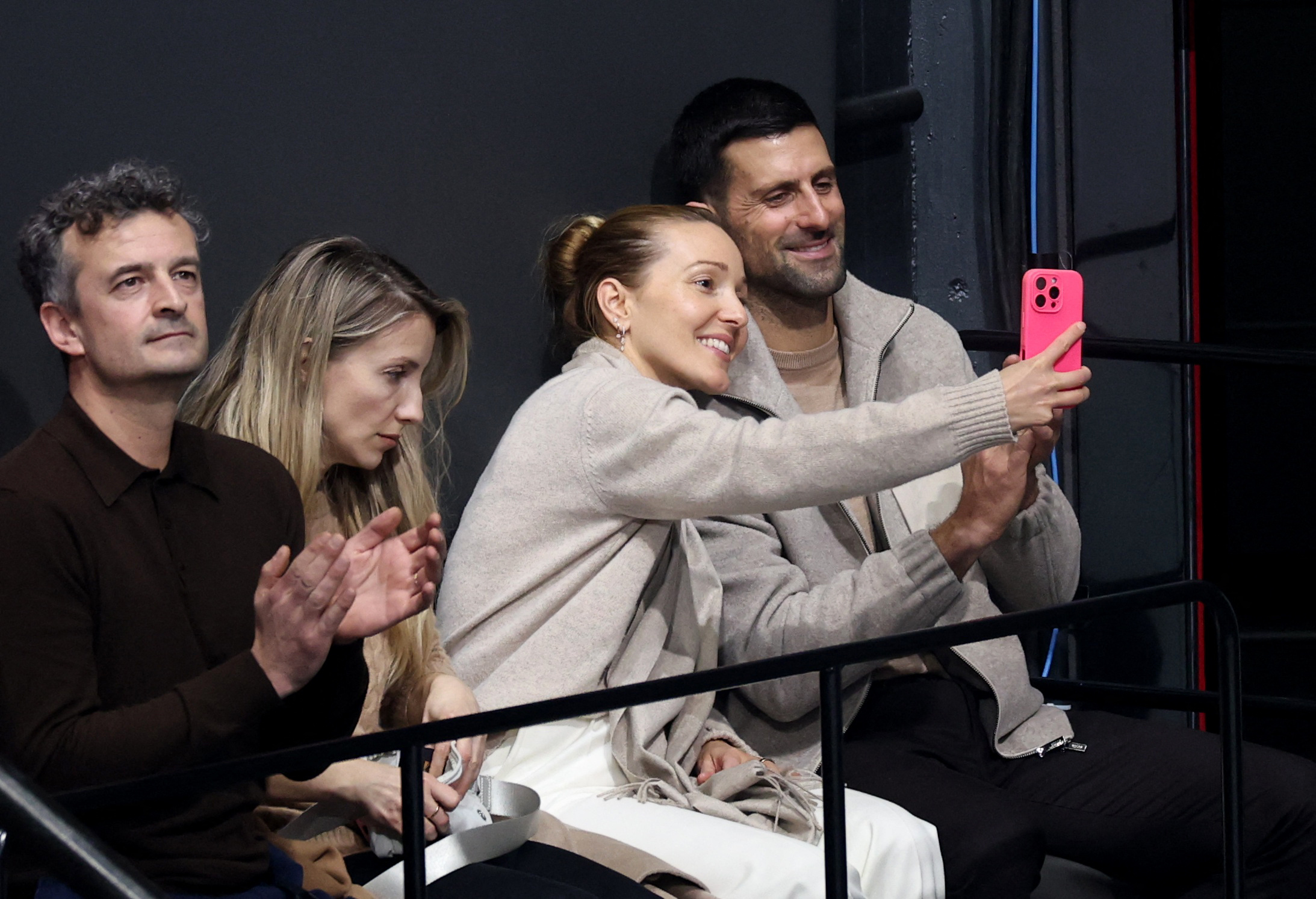 Milano Cortina 2026 Olympics - Figure Skating - Team Event - Men Single Skating - Free Skating - Milano Ice Skating Arena, Milan, Italy - February 08, 2026. Tennis player Novak Djokovic selfie with Jelena Djokovic Đoković of the men's s