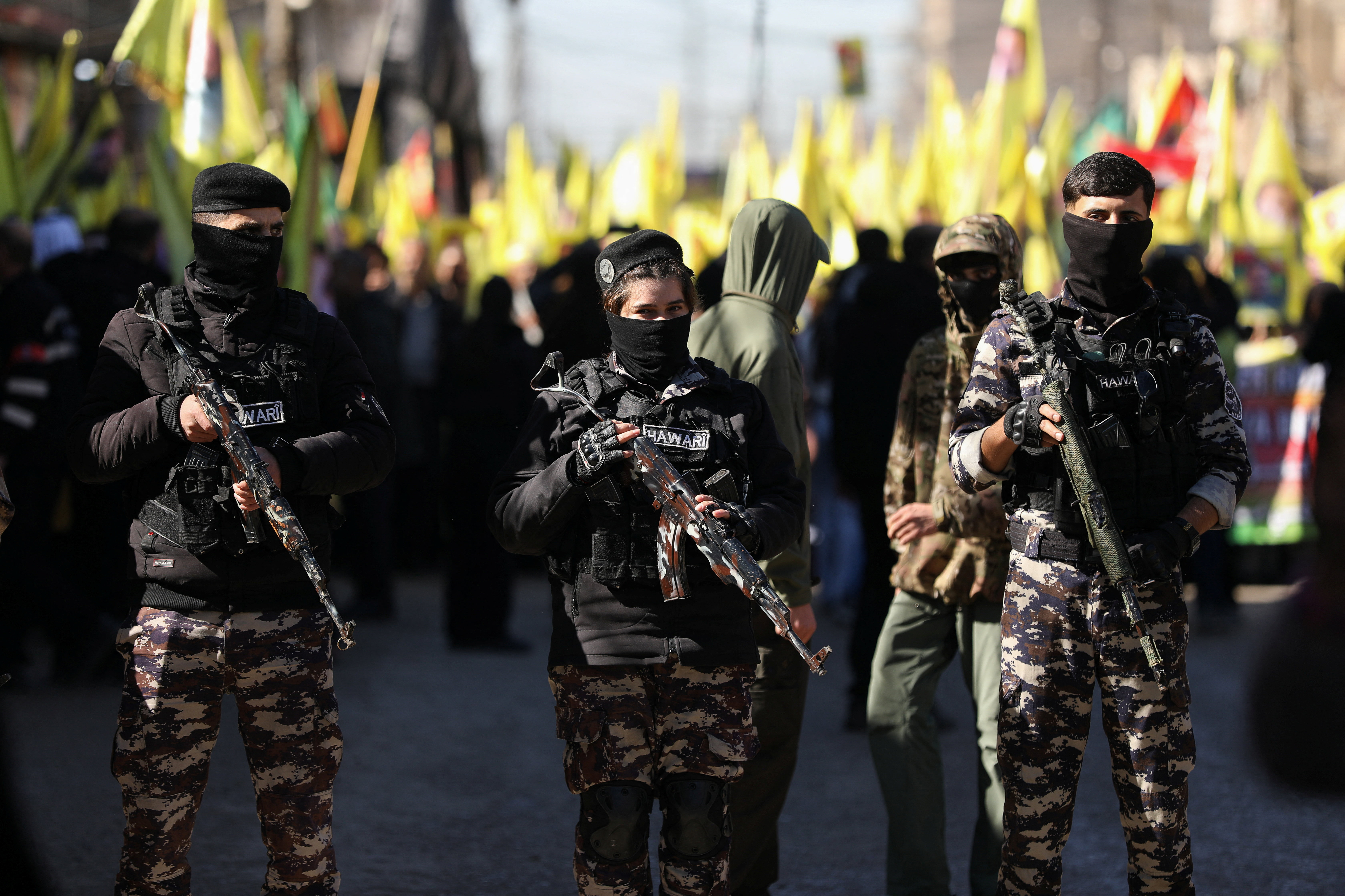 Kurdish internal security forces stand guard Qamishli, Syria February 15, 2026. REUTERS/Orhan Qereman