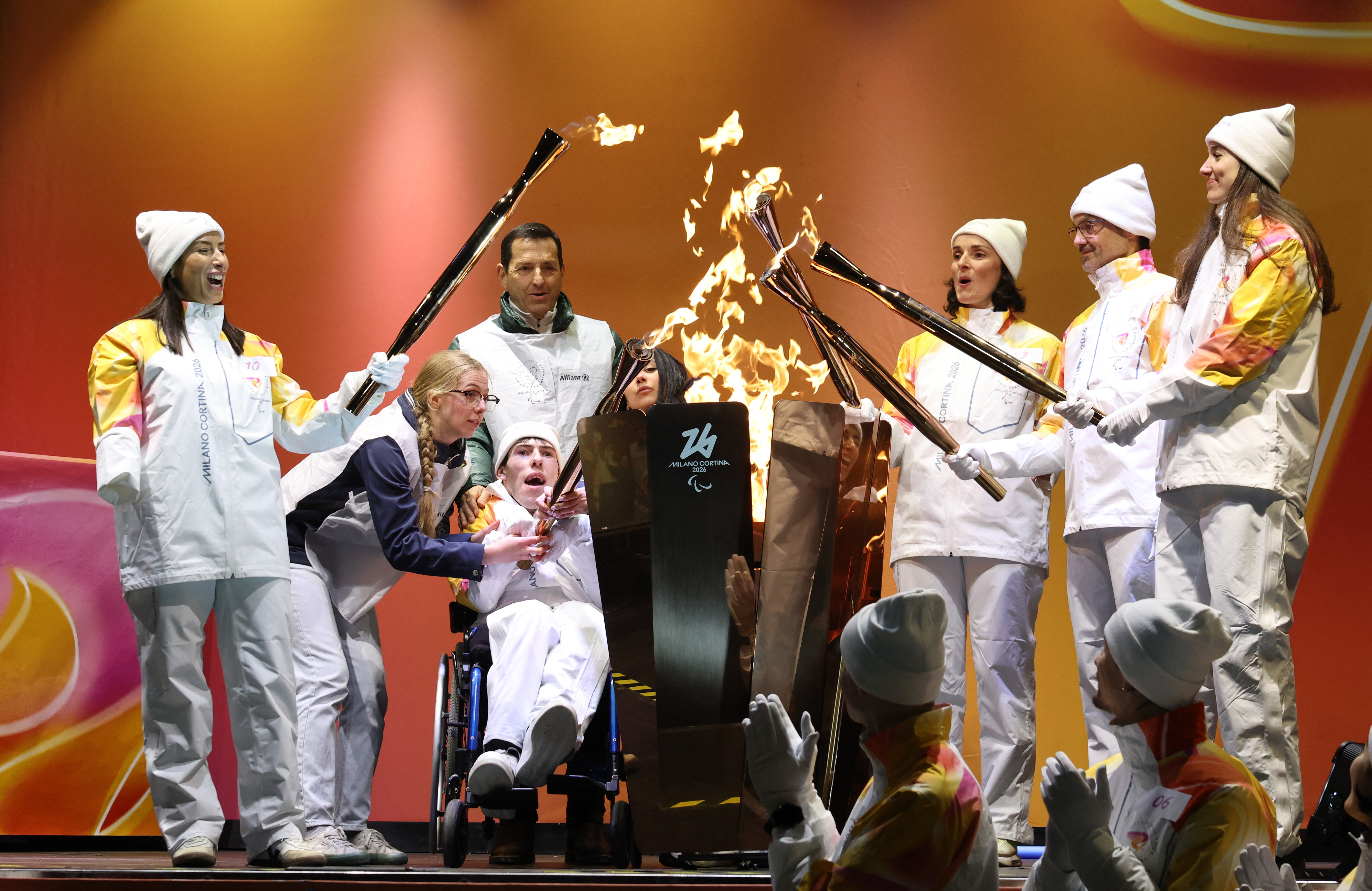 Milano Cortina 2026 Winter Paralympics - Union Ceremony - Cortina D'Ampezzo, Italy - March 3, 2026 Torchbearers ahead of the Milano Cortina 2026 Winter Paralympics REUTERS/Louisa Gouliamaki