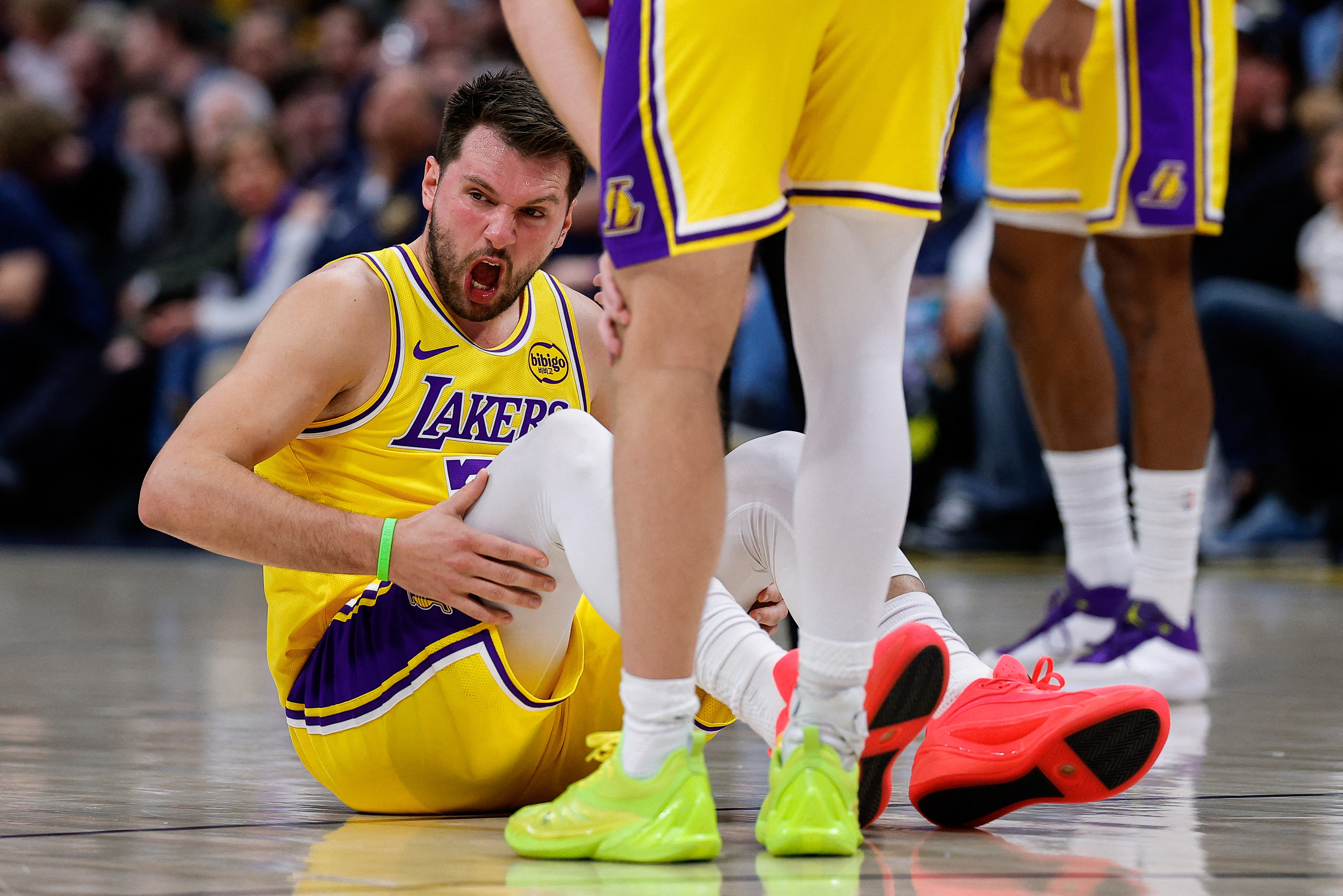 Mar 5, 2026; Denver, Colorado, USA; Los Angeles Lakers guard Luka Doncic (77) reacts after a play in the first quarter against the Denver Nuggets at Ball Arena. Mandatory Credit: Isaiah J. Downing-Imagn Images