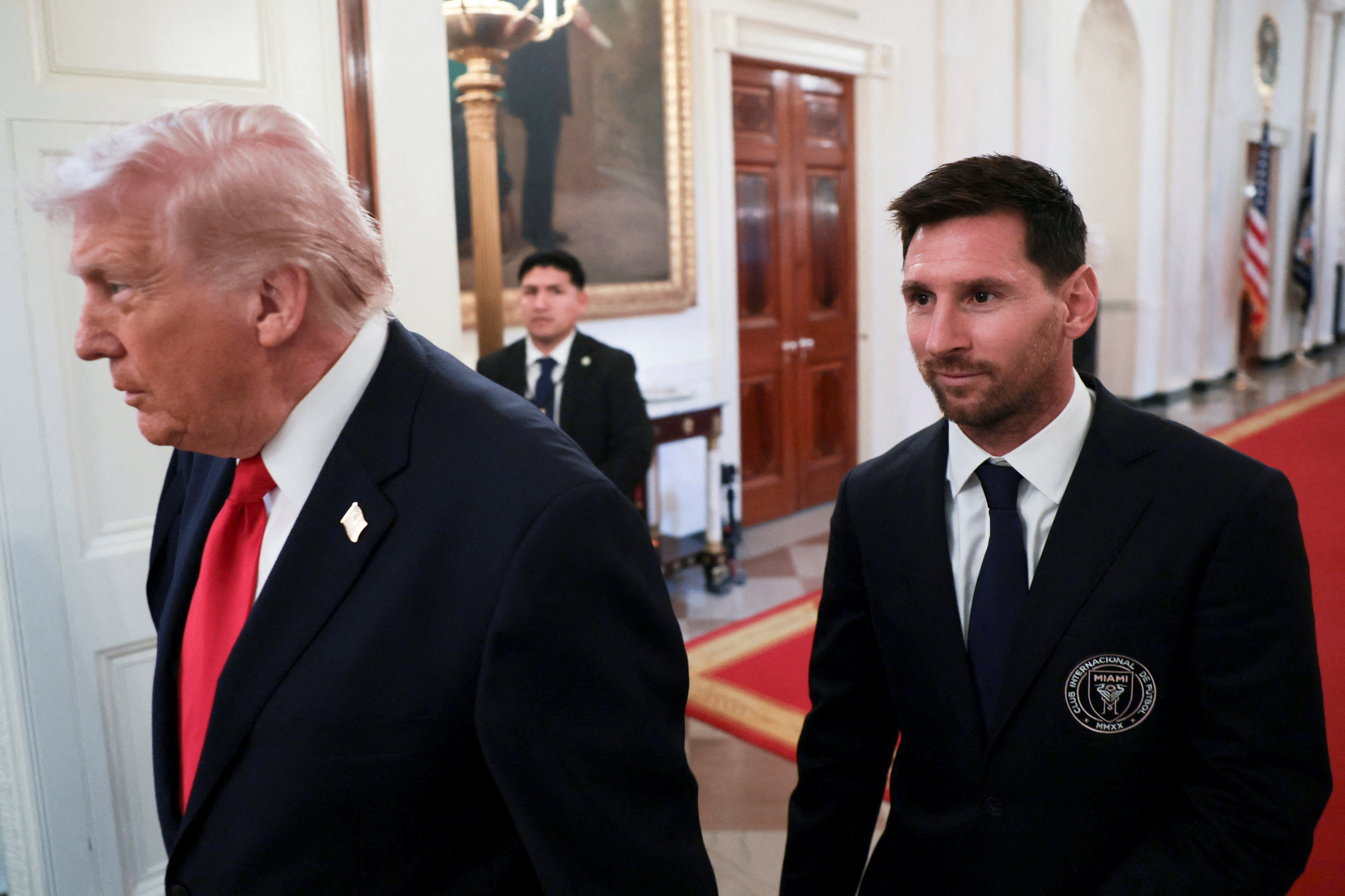 U.S. President Donald Trump arrives with Inter Miami CF captain Lionel Messi on the