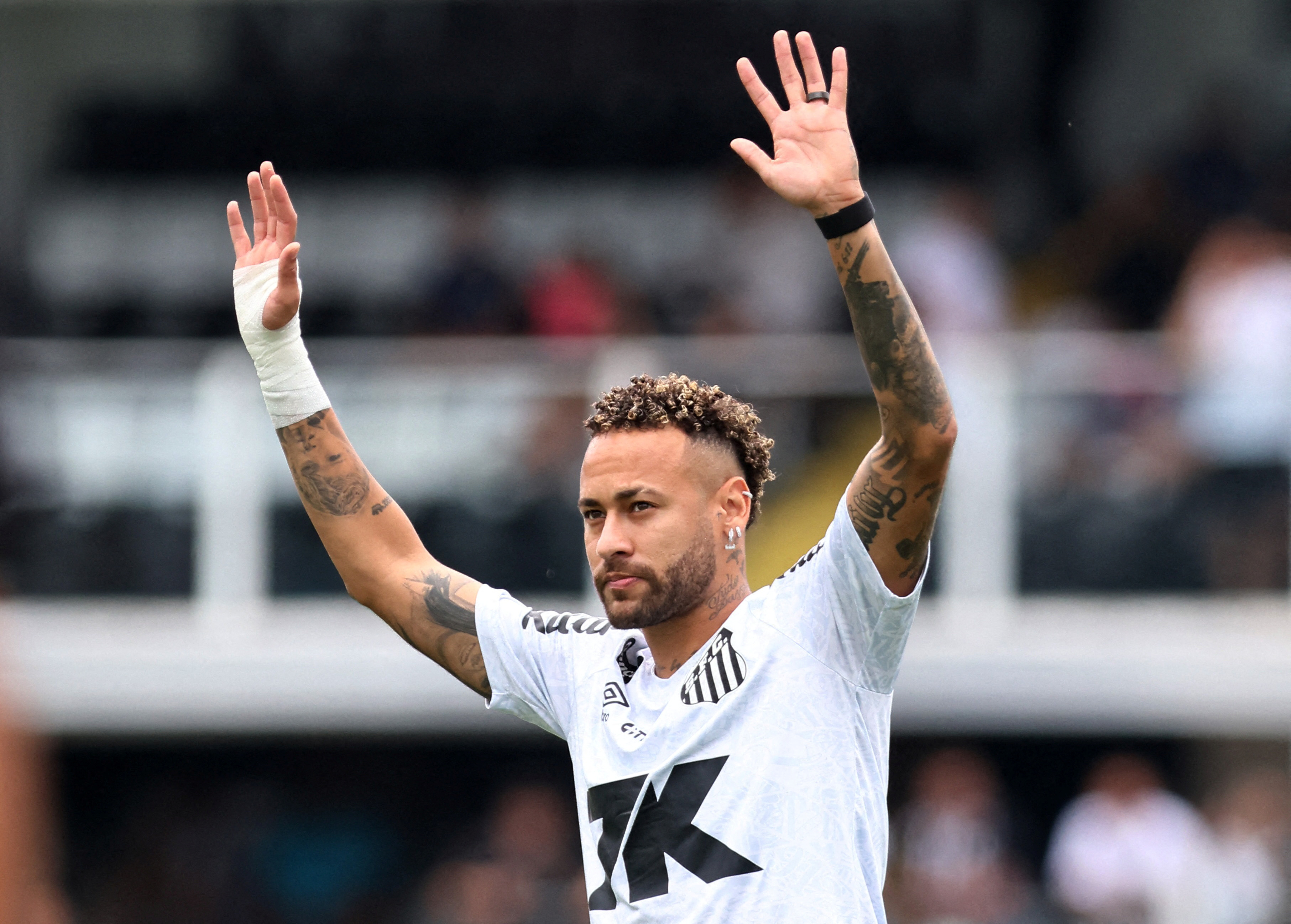 FILE PHOTO: Soccer Football - Brasileiro Championship - Santos v Cruzeiro - Estadio Urbano Caldeira, Santos, Brazil - December 7, 2025 Santos' Neymar during the warm up before the match REUTERS/Thiago Bernardes/File Photo