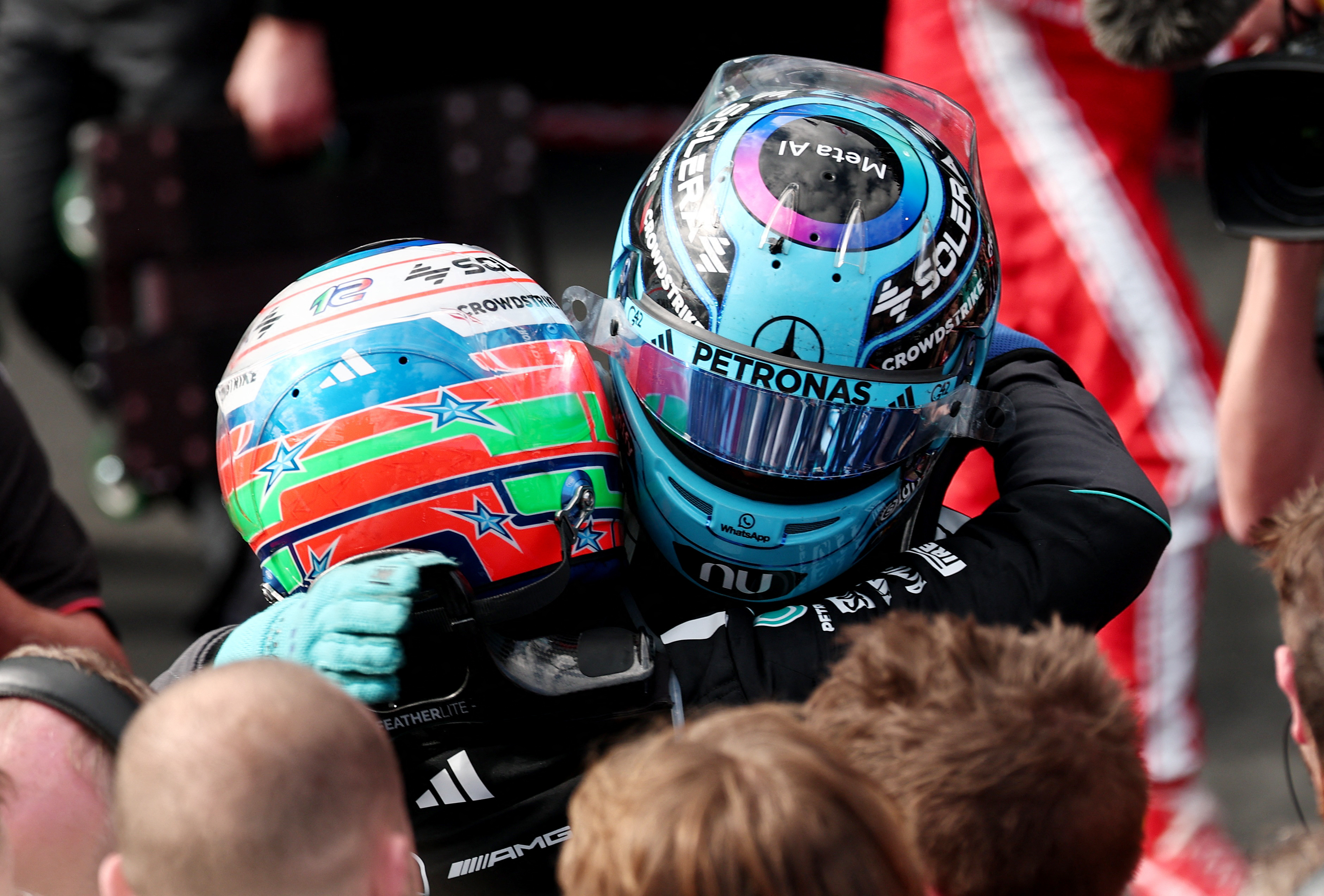 Formula One F1 - Australian Grand Prix - Albert Park Grand Prix Circuit, Melbourne, Australia - March 8, 2026 Mercedes' George Russell celebrates after winning the Australian Grand Prix alongside second placed Mercedes' Andrea Kimi Antonelli REUTERS/Mark