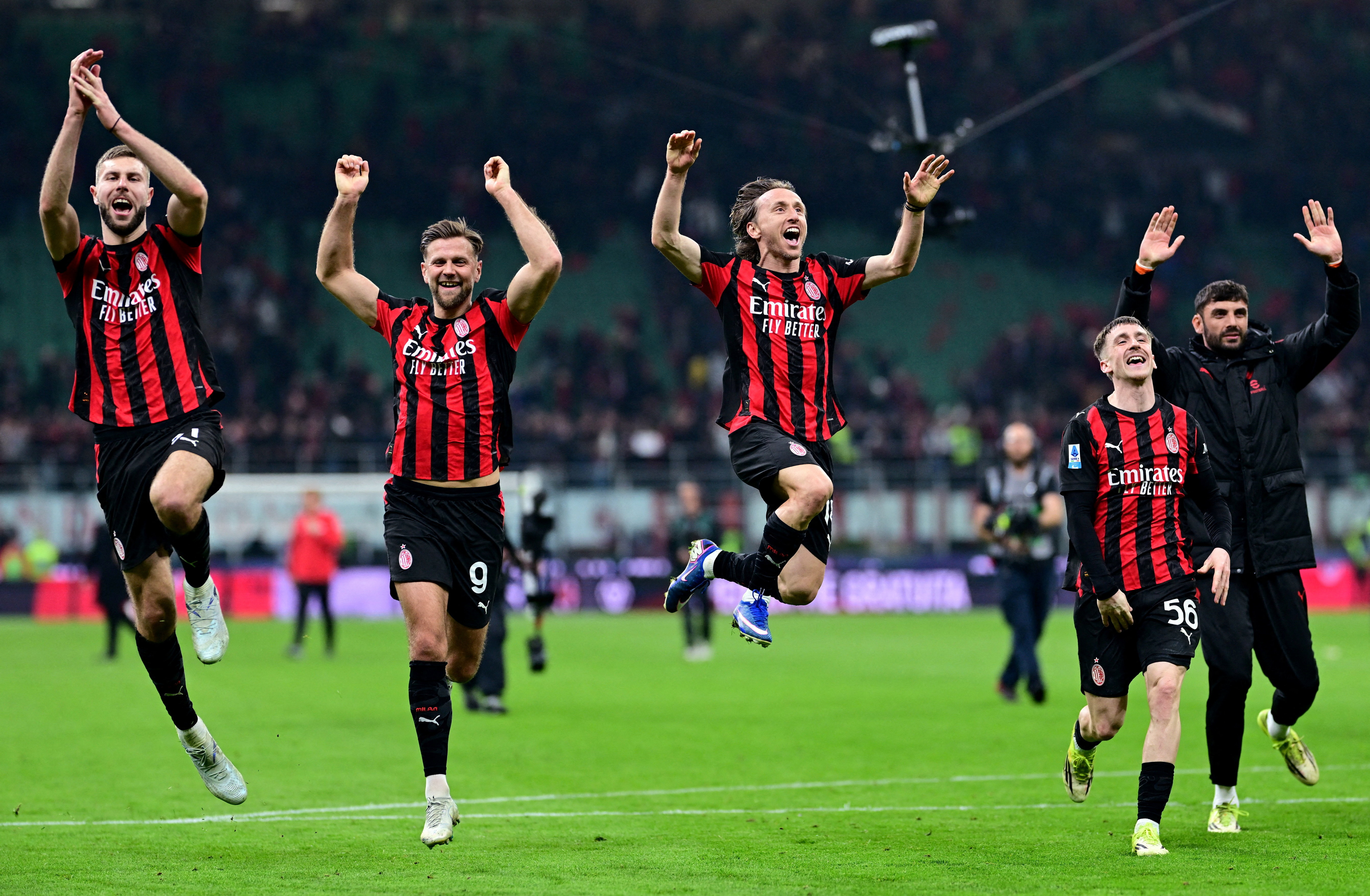 Soccer Football - Serie A - AC Milan v Inter Milan - San Siro, Milan, Italy - March 8, 2026 AC Milan's Luka Modric, Niclas Fullkrug, Strahinja Pavlovic and Alexis Saelemaekers celebrate after the match REUTERS/Daniele Mascolo     TPX IMAGES OF THE DAY
